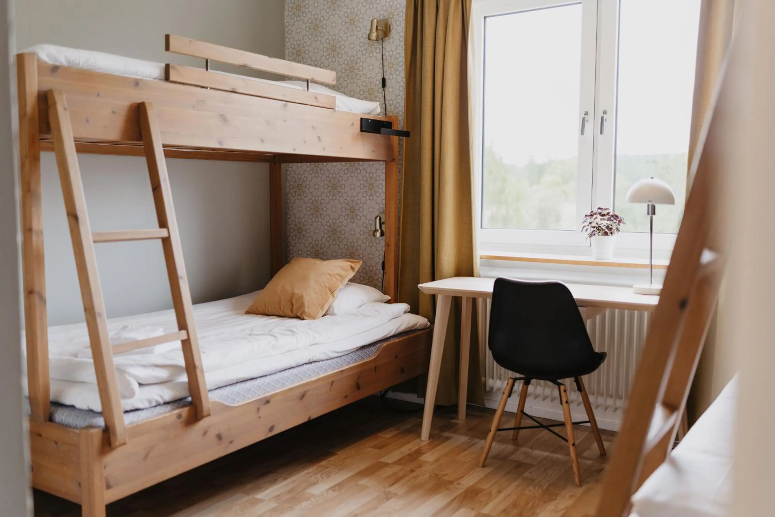 Photo of the whole room, Bed in Vassbo Vandrarhem