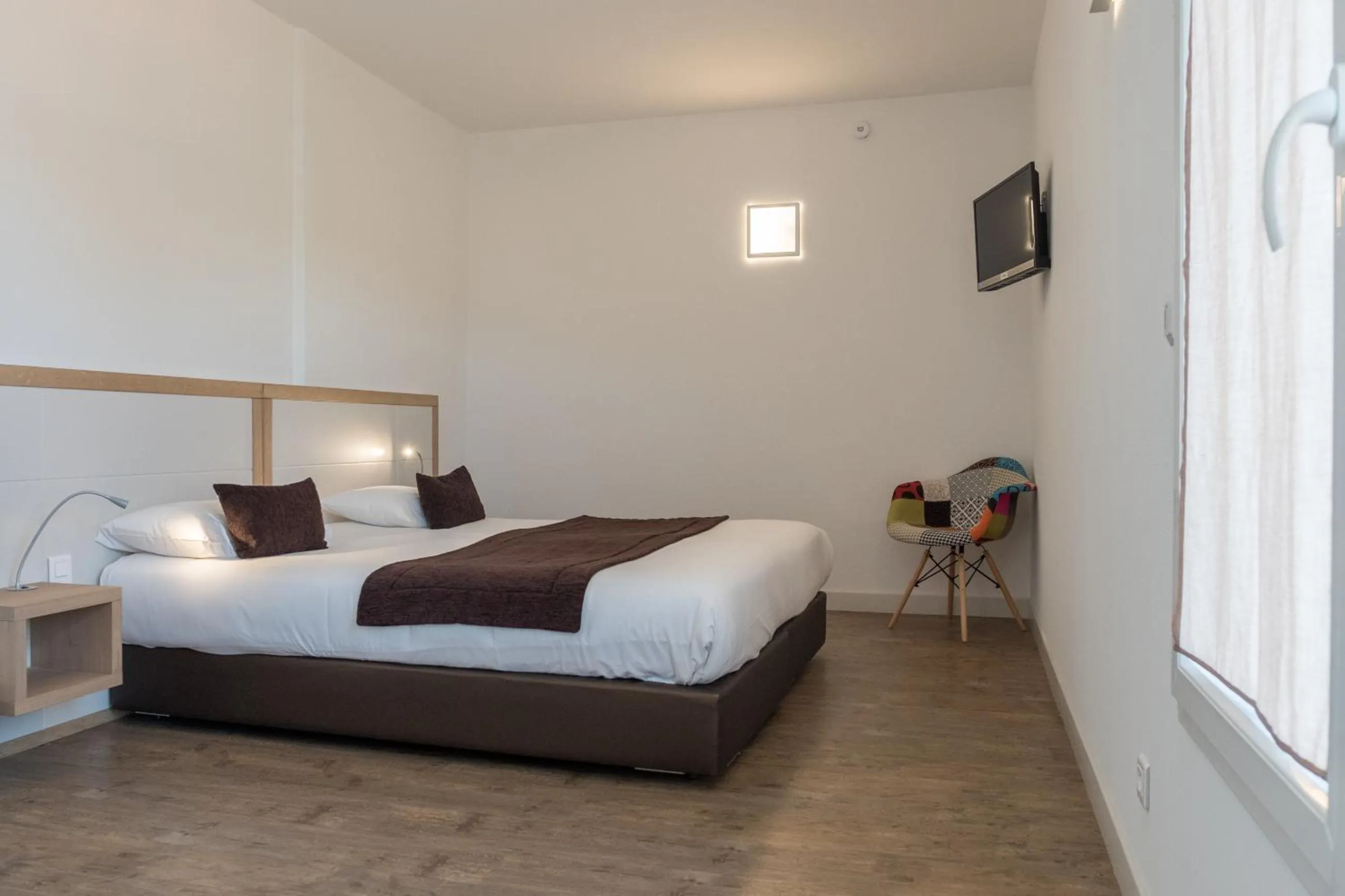 Photo of the whole room, Bed in Hôtel de la Rhune