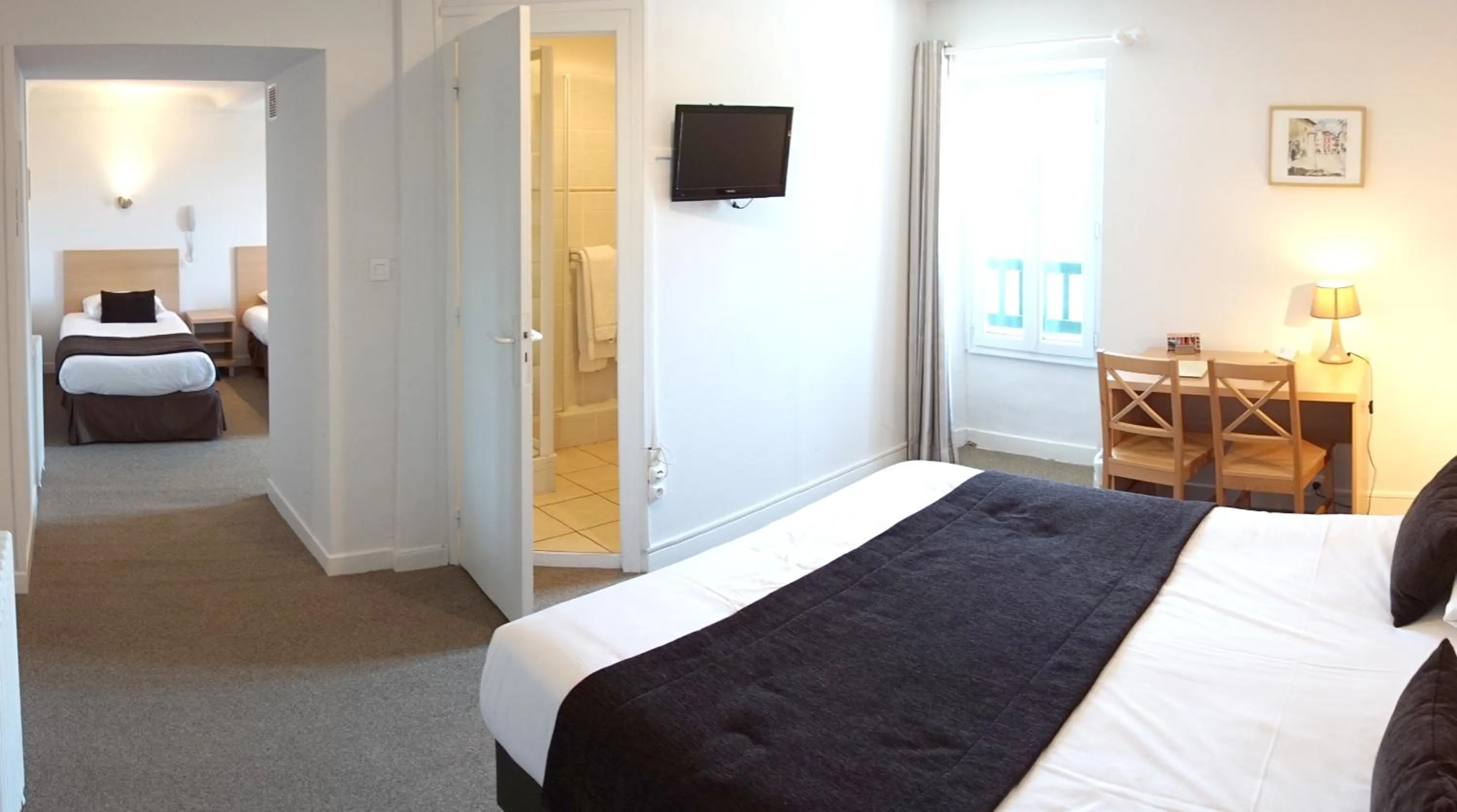 Photo of the whole room, Bed in Hôtel de la Rhune