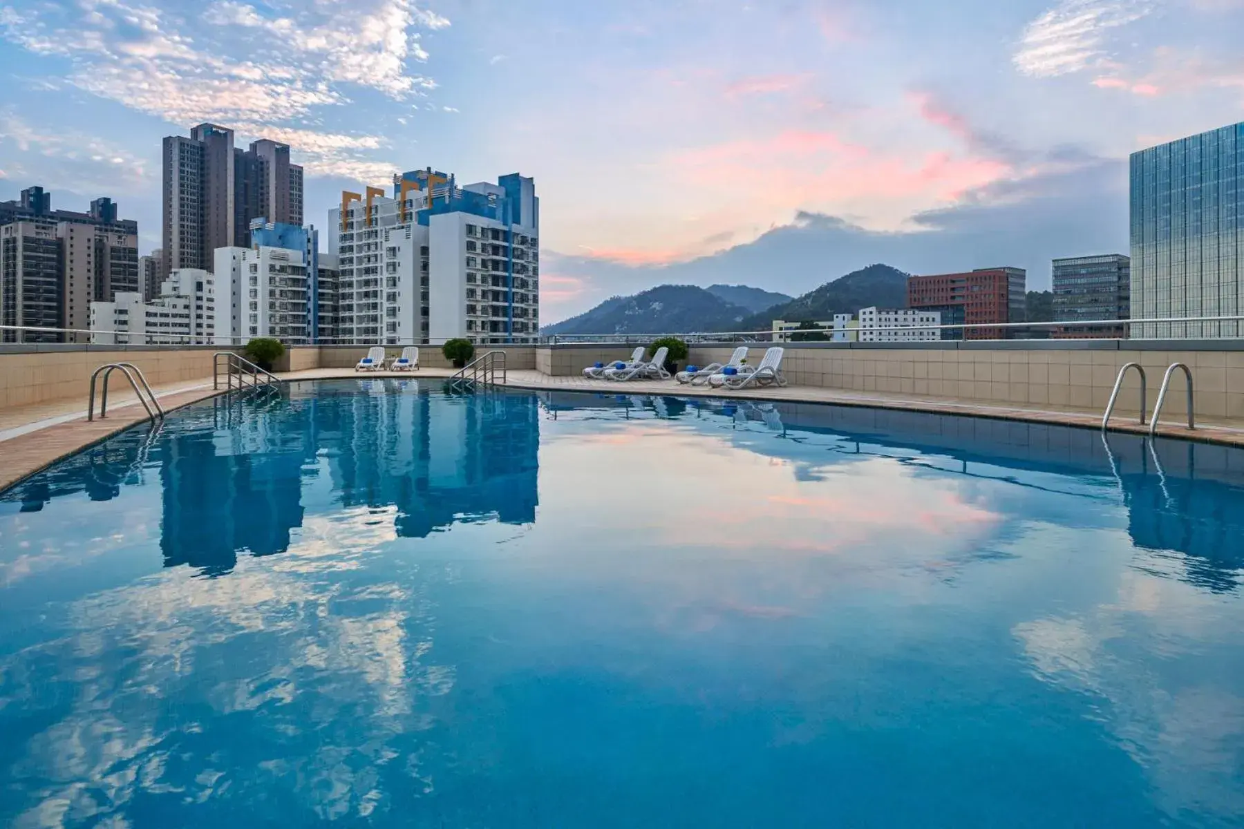 Pool view in Crowne Plaza Zhuhai City Center by IHG - offers free one-way shuttle to Chimelong Ocean Kingdom Pool view in Crowne Plaza Zhuhai City Center by IHG - offers free one-way shuttle to Chimelong Ocean Kingdom