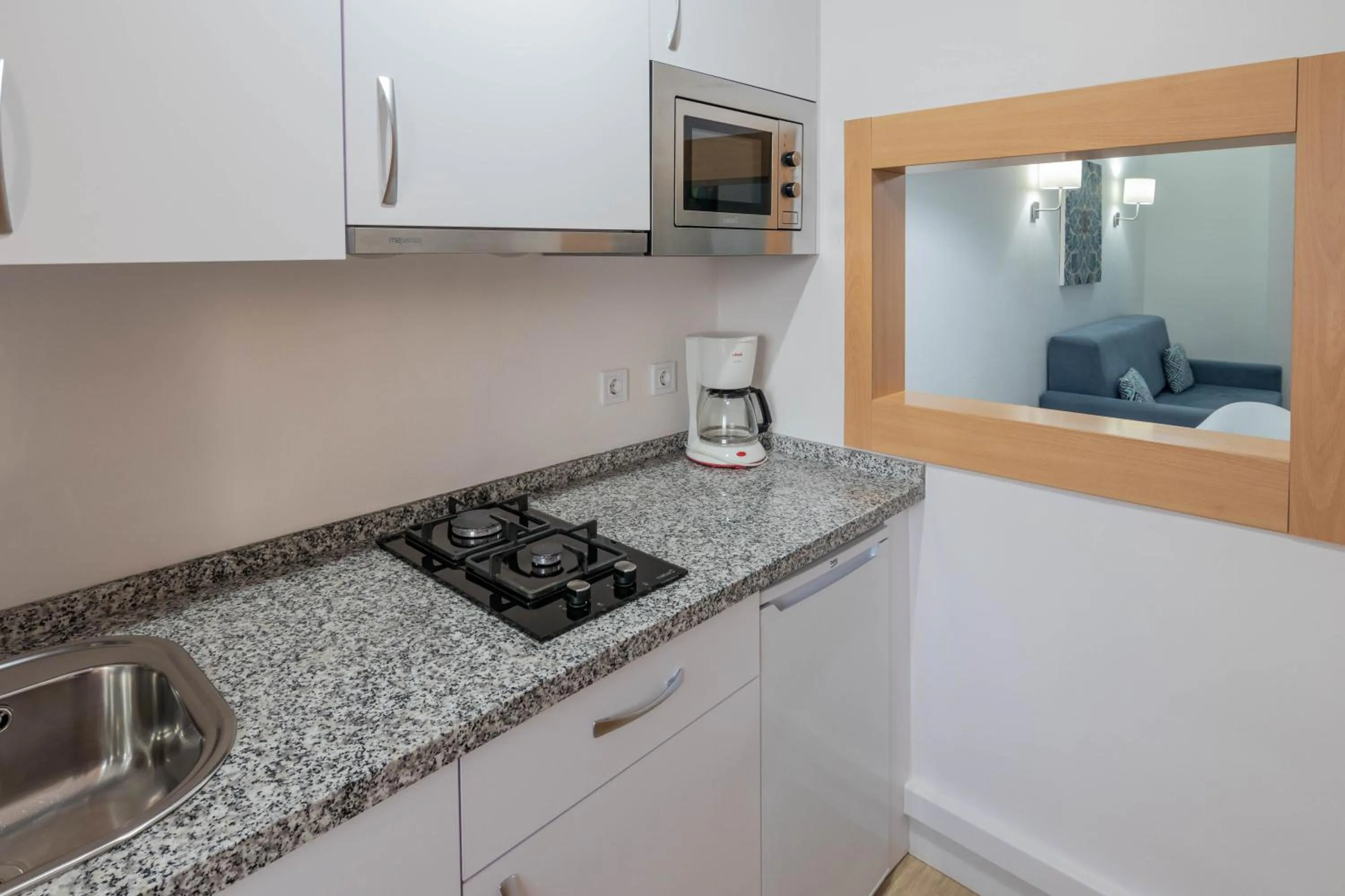 Kitchen or kitchenette in Apartamentos Buensol