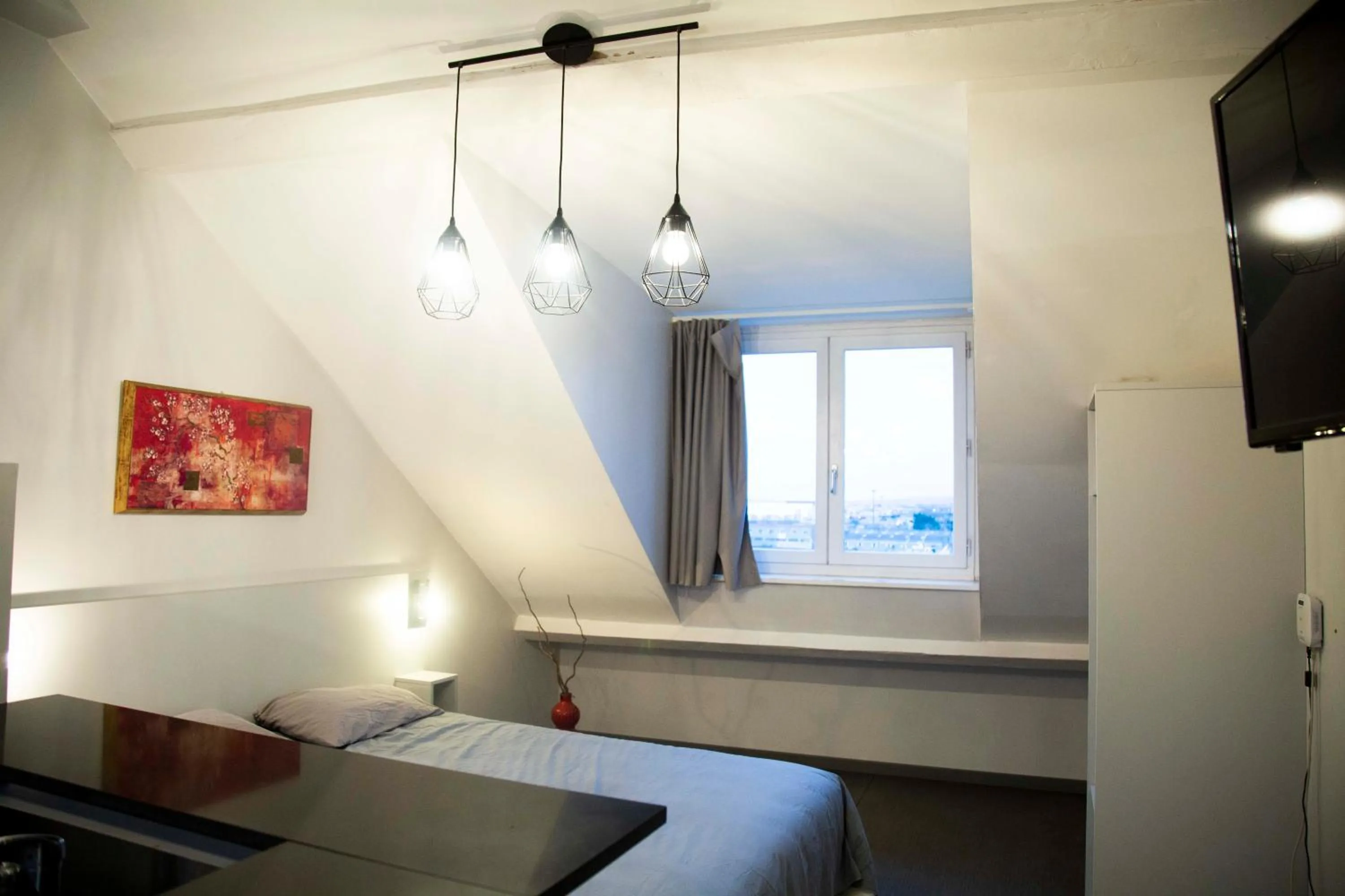 Bed in Smartappart Cherbourg (la rose des vents)