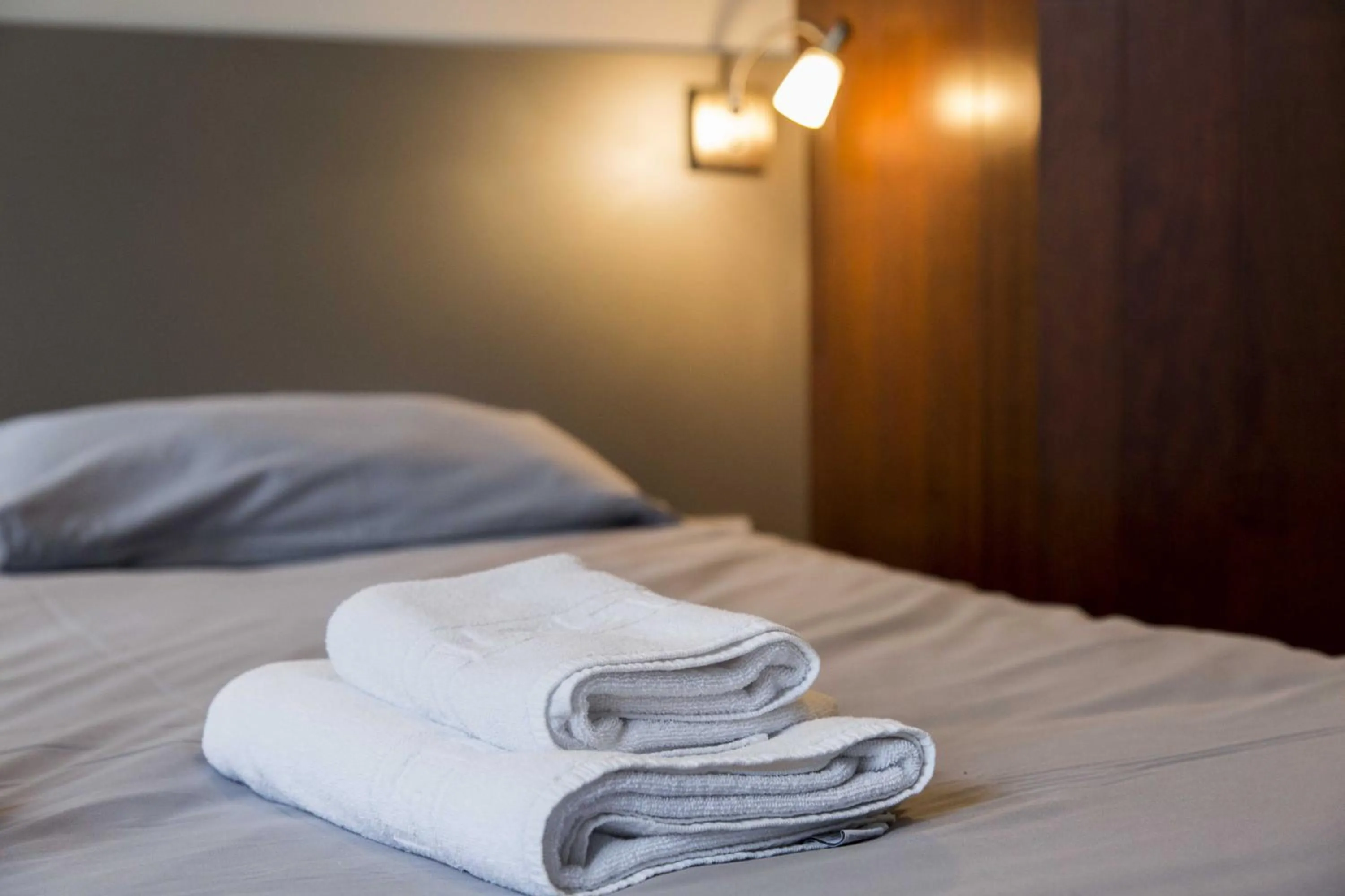 Bed in Smartappart Cherbourg (la rose des vents)