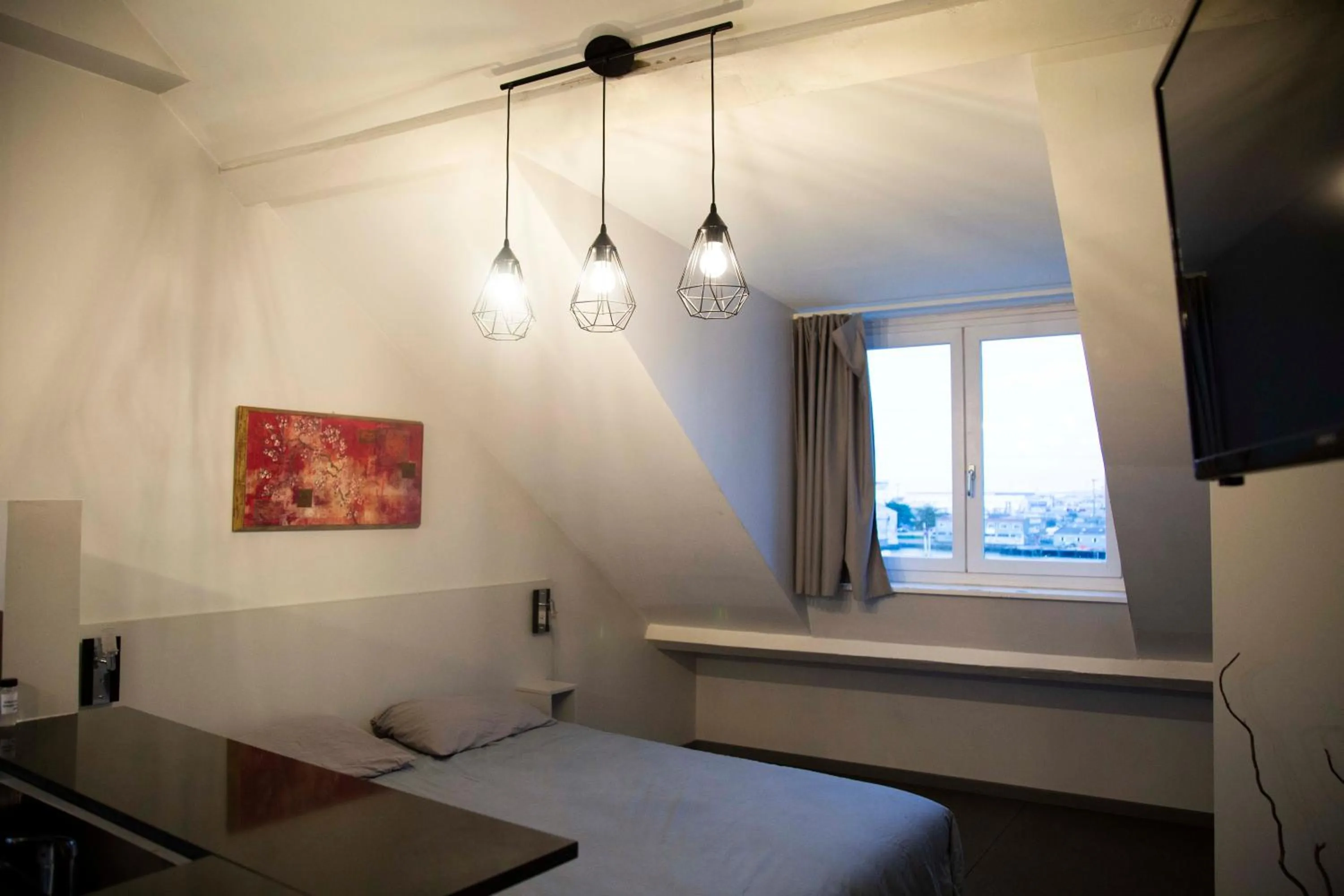 Bed in Smartappart Cherbourg (la rose des vents)