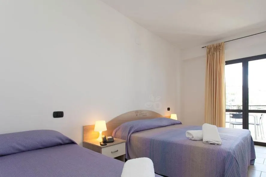 Bed in Hotel Diamond Residence