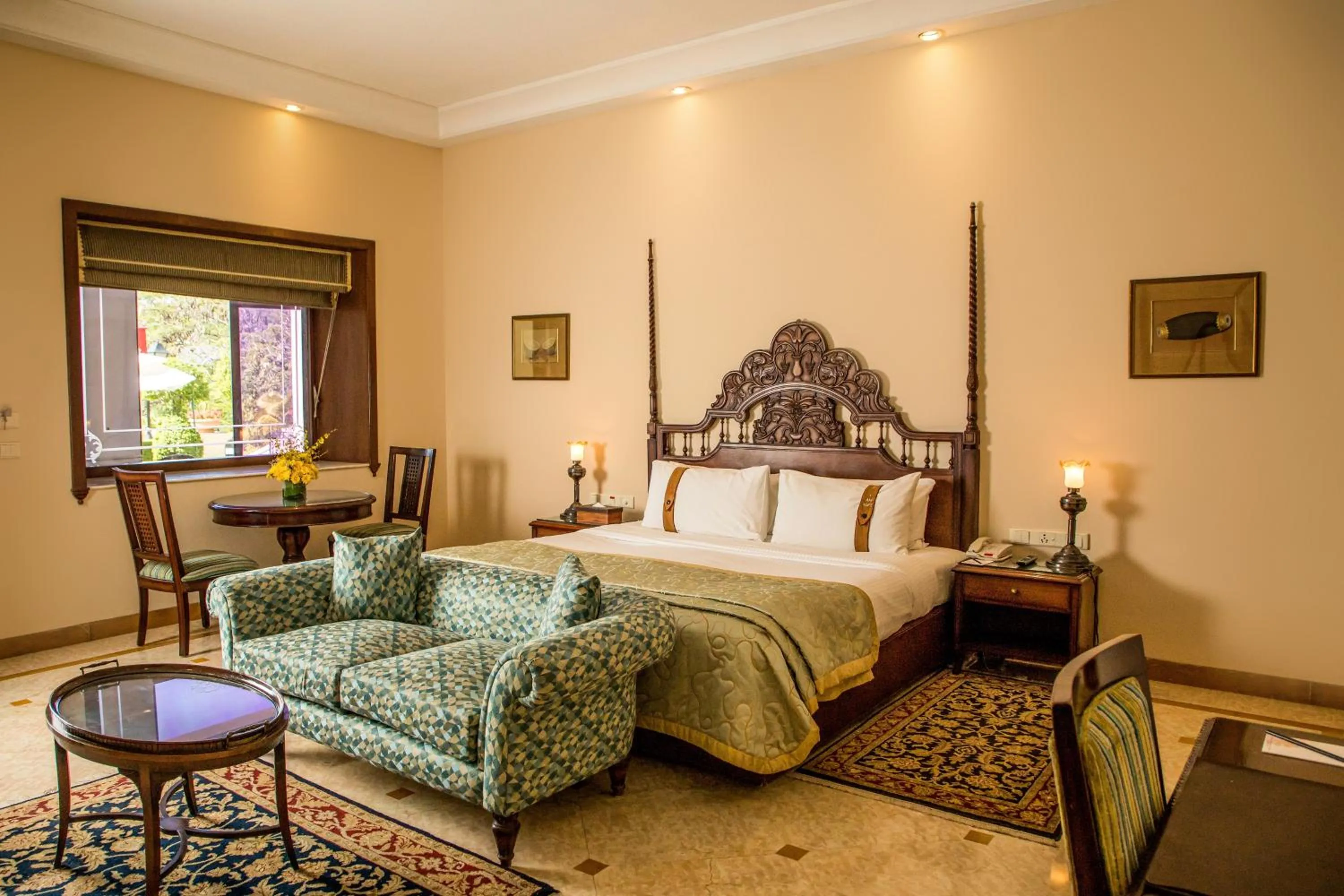 Bed in The Lalit Laxmi Vilas Palace