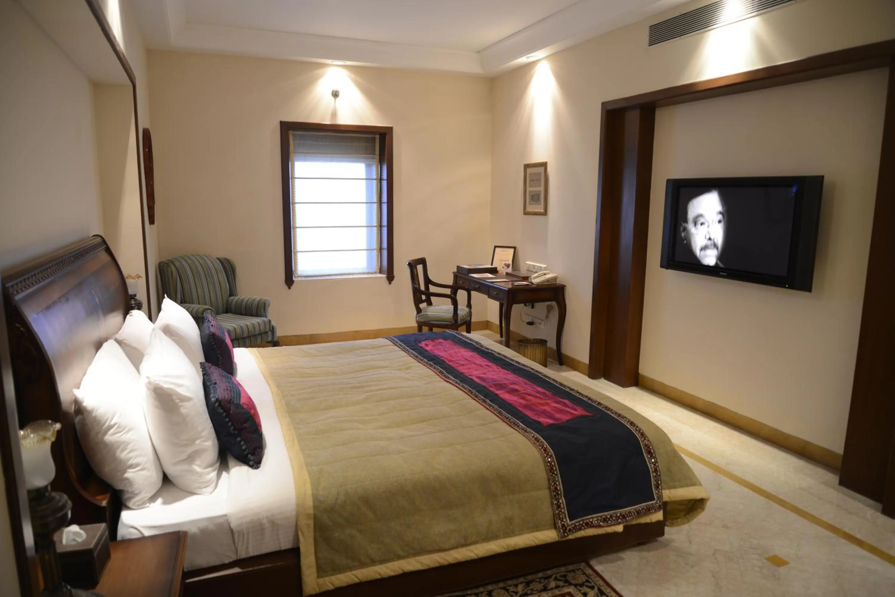 Bed in The Lalit Laxmi Vilas Palace