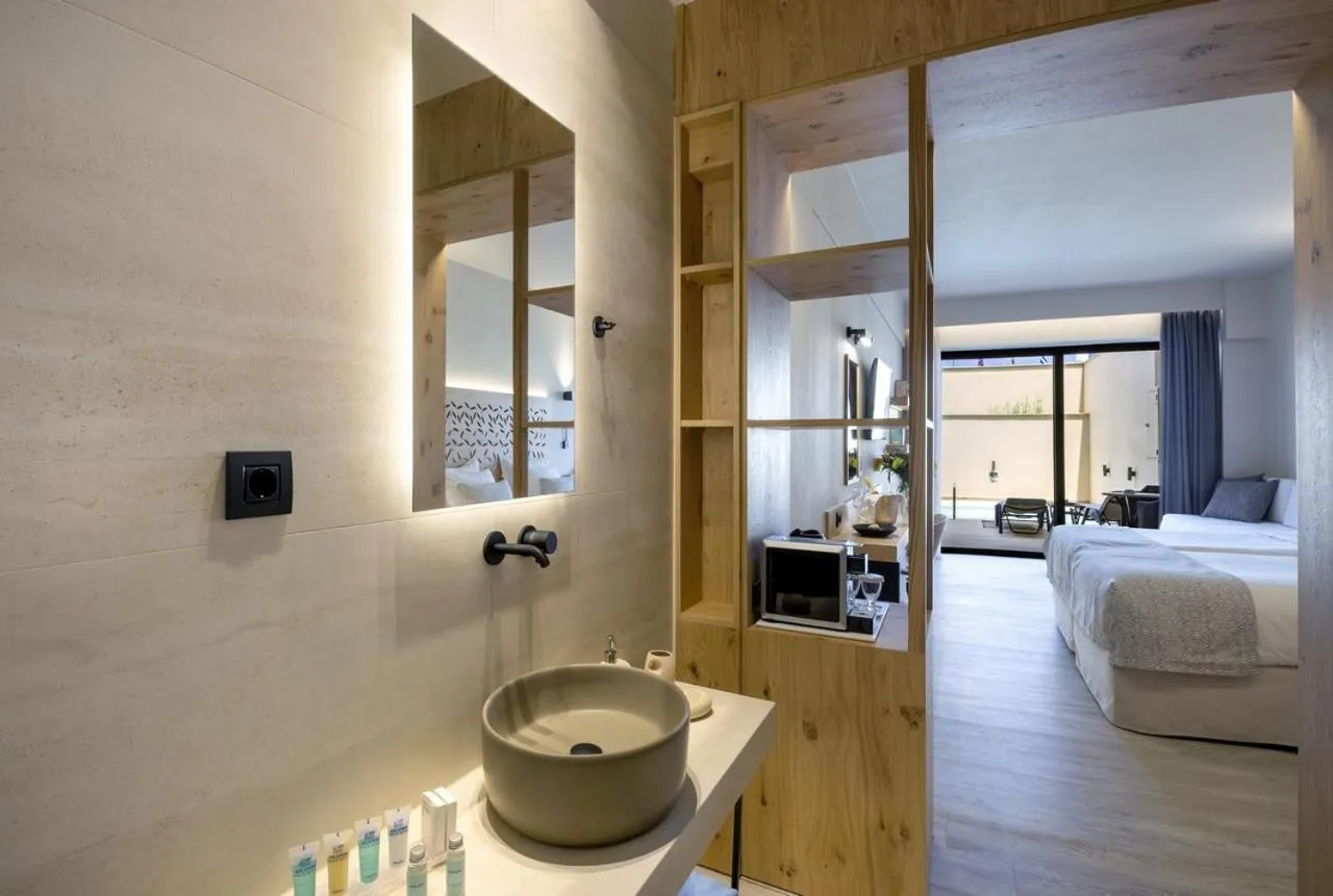 Bed in Atlantis Beach Hotel