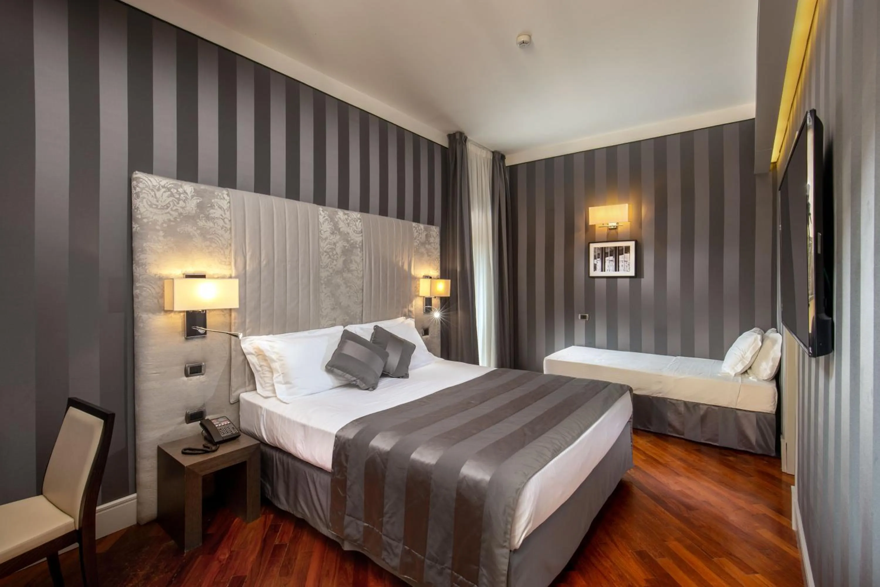 Bed in Monti Palace Hotel