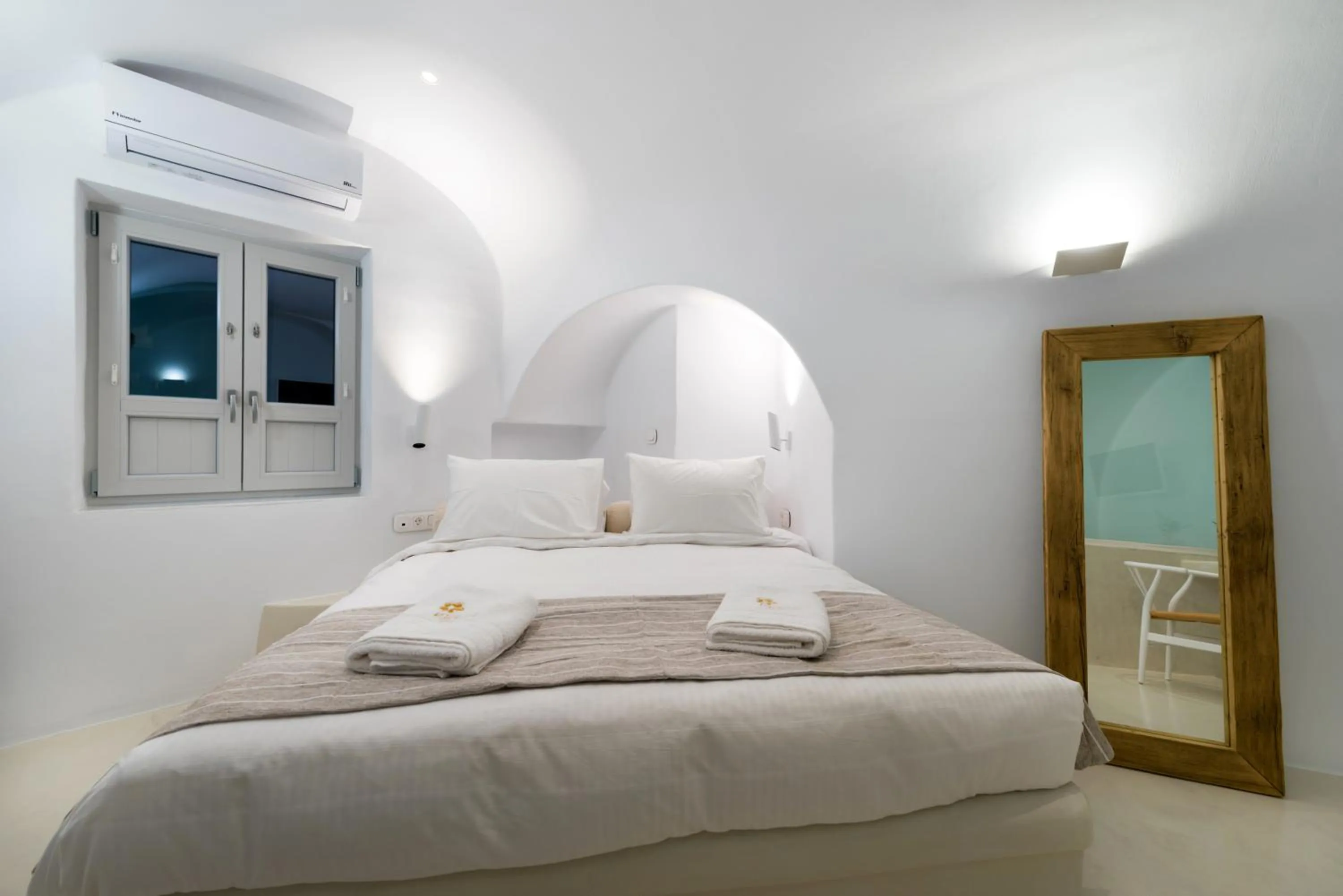 Bed in Iriana Suites