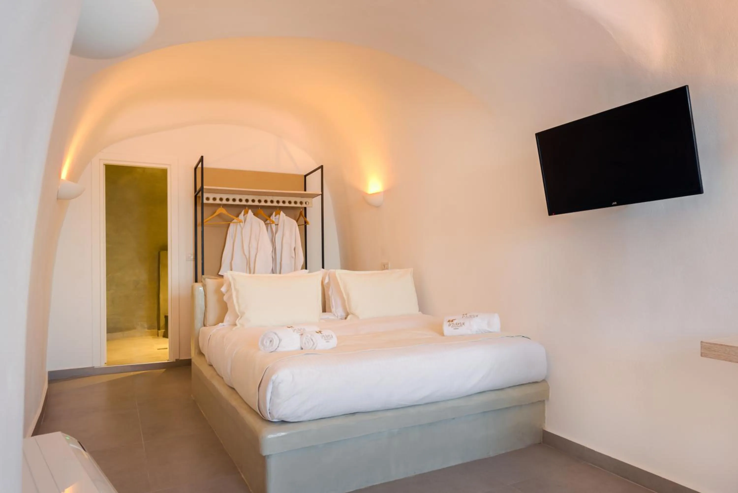 Bed in Iriana Suites