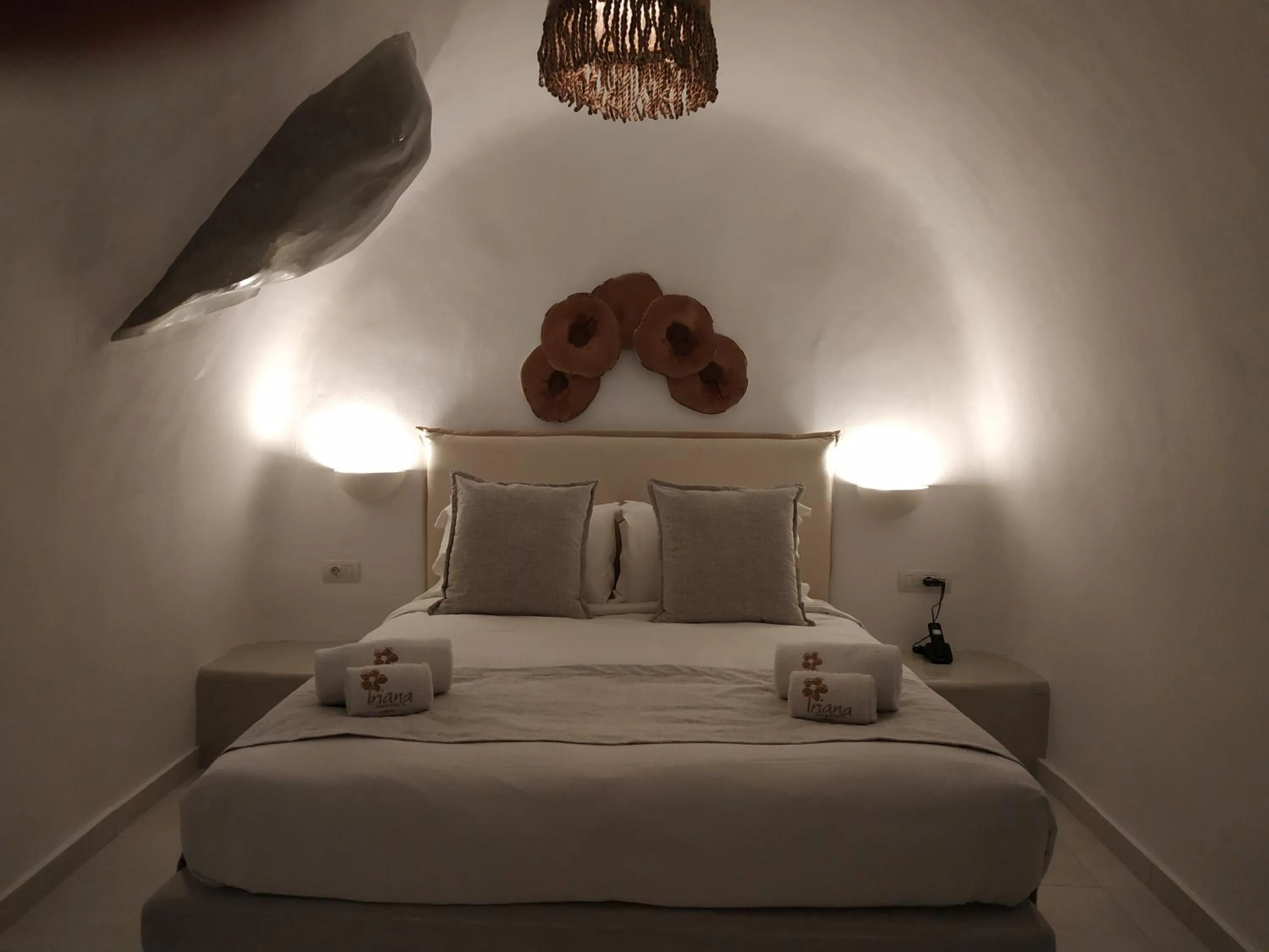 Bed in Iriana Suites