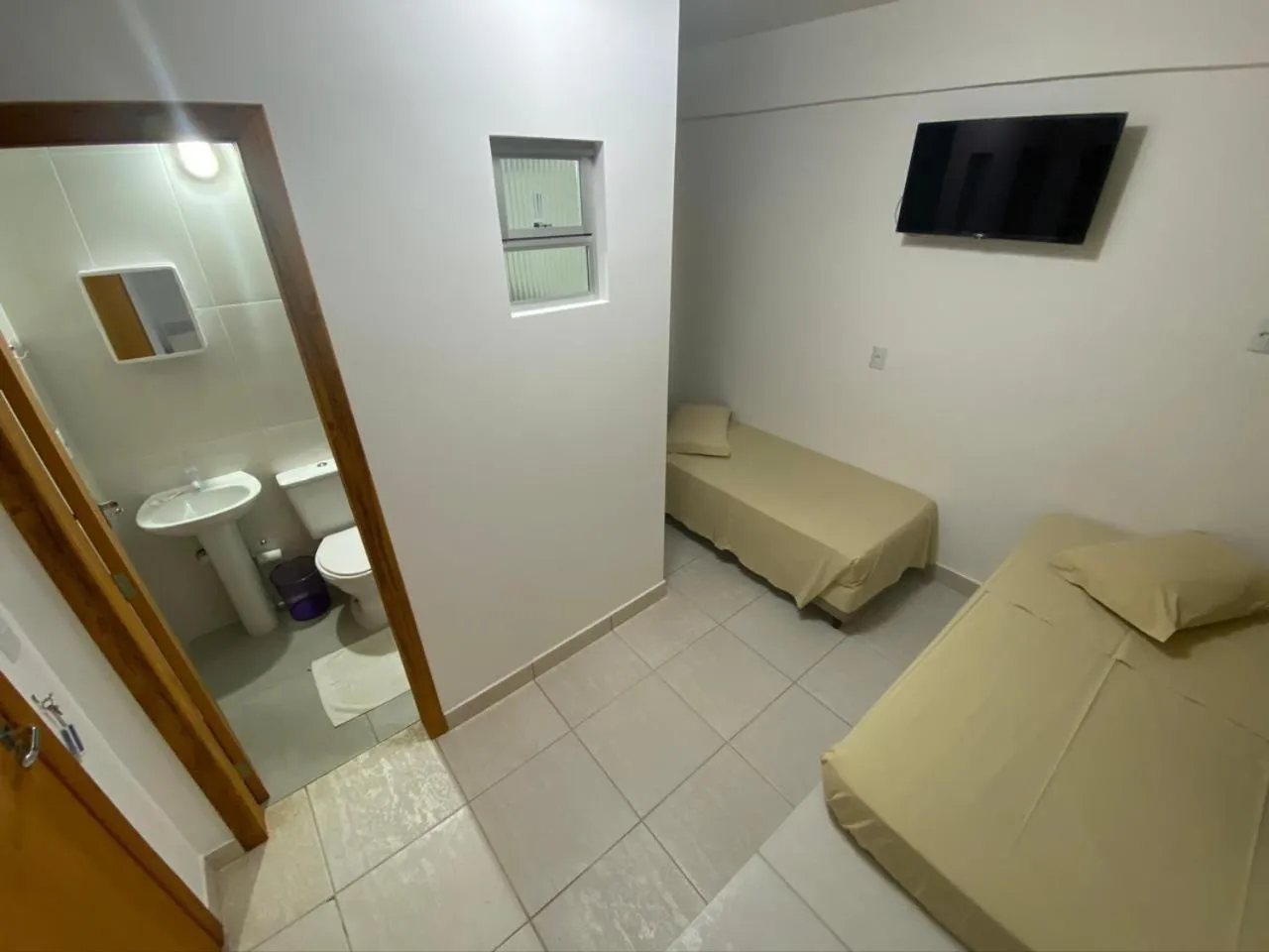 Photo of the whole room, Bed in Pousada Morada das Nações