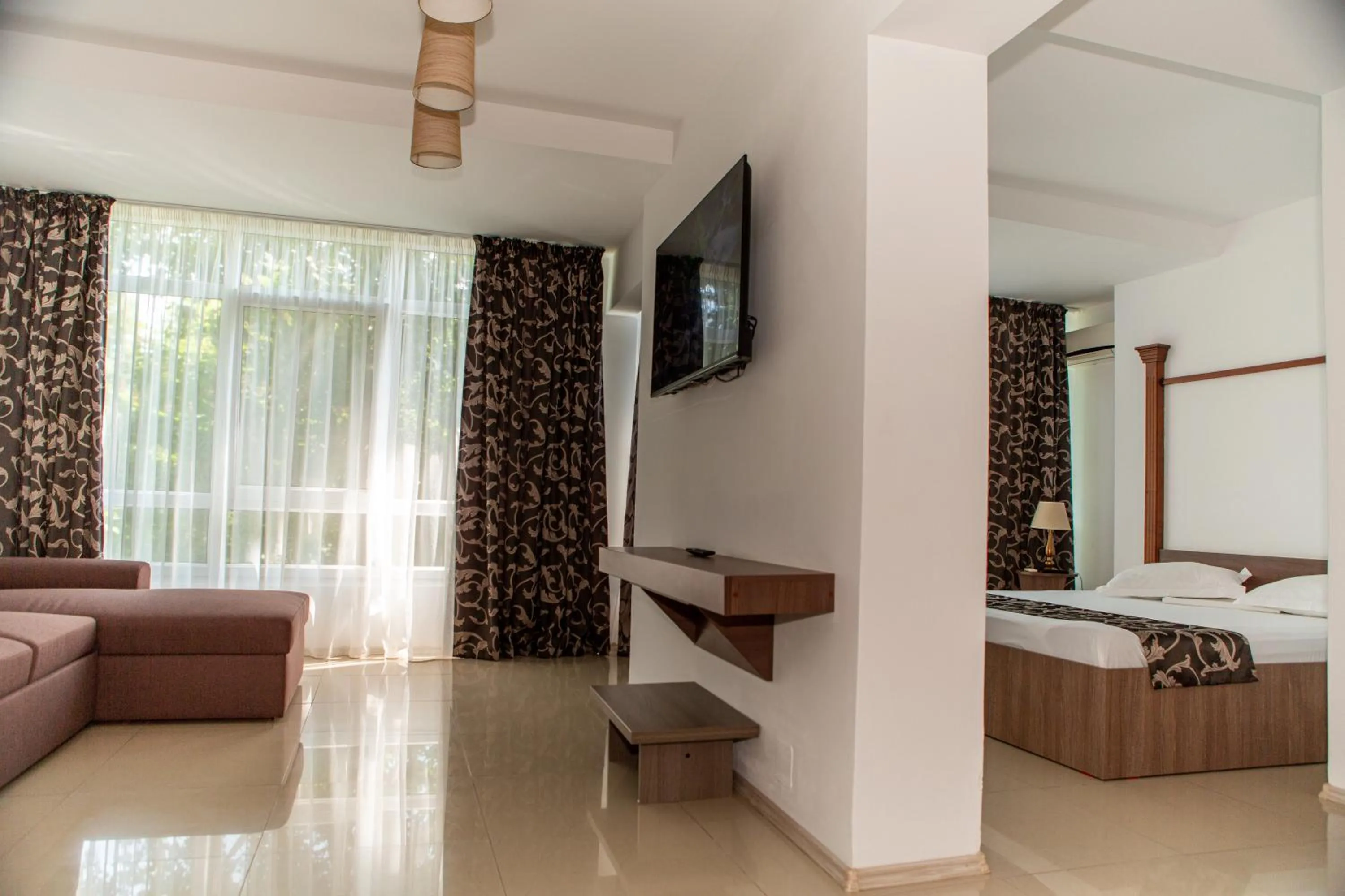 Communal lounge/ TV room in Hotel 2D Resort and Spa