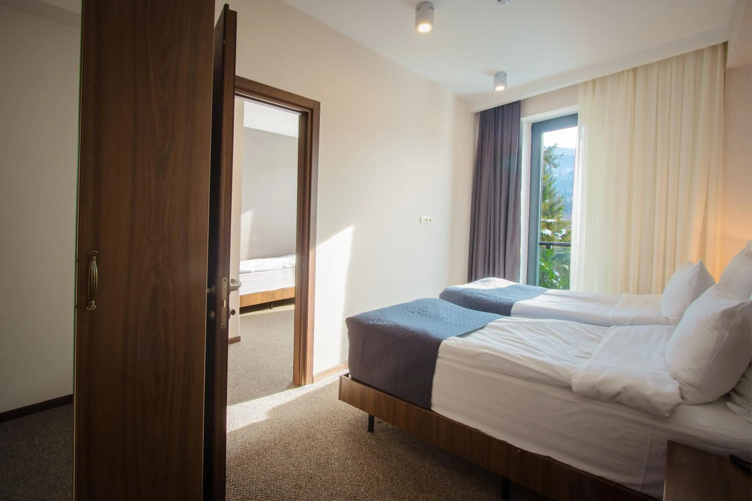 Bed in AuRoom Bakuriani Resort