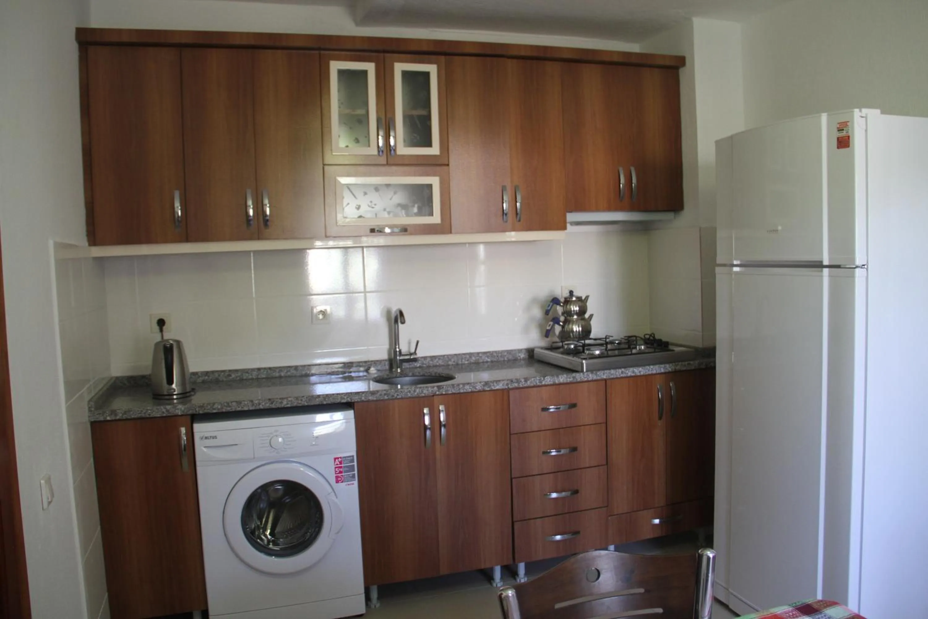Kitchen or kitchenette in Apollon Hotel