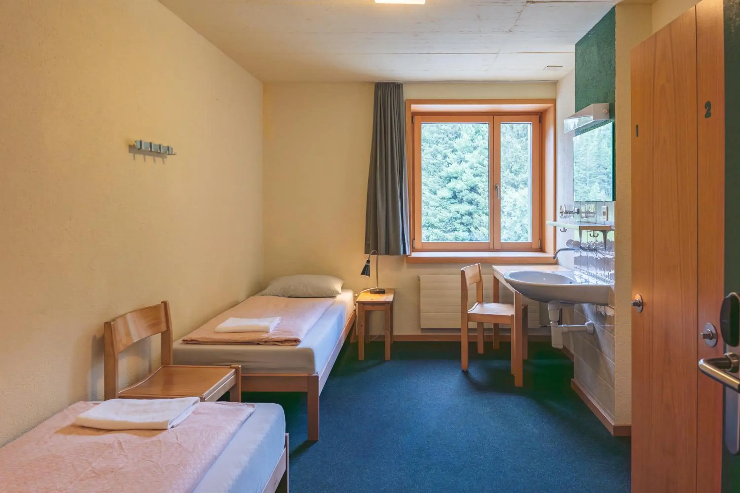 Twin Room with Shared Bathroom in St. Moritz Youth Hostel Twin Room with Shared Bathroom in St. Moritz Youth Hostel