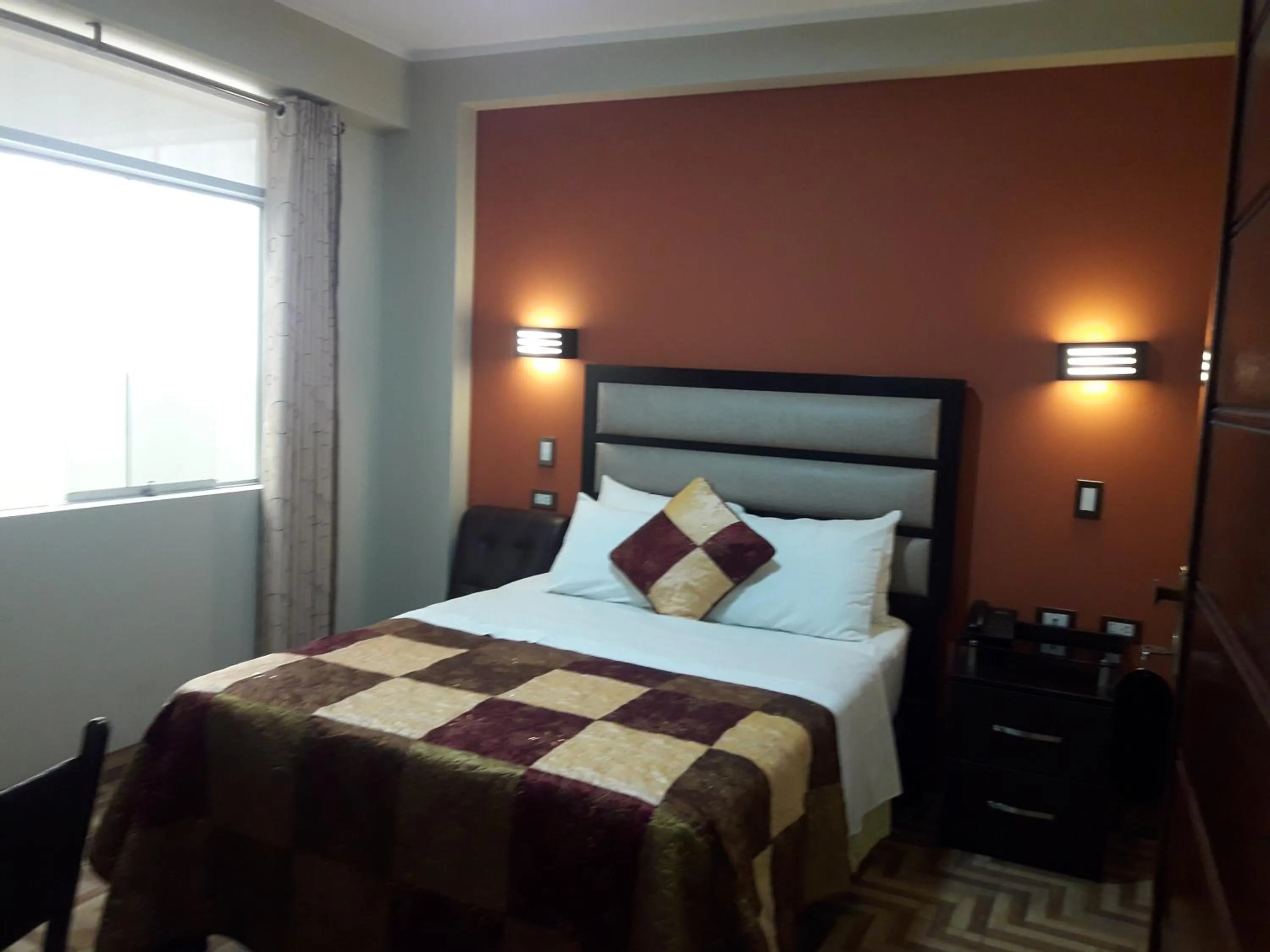 Bed in Gavina Inn Hotel