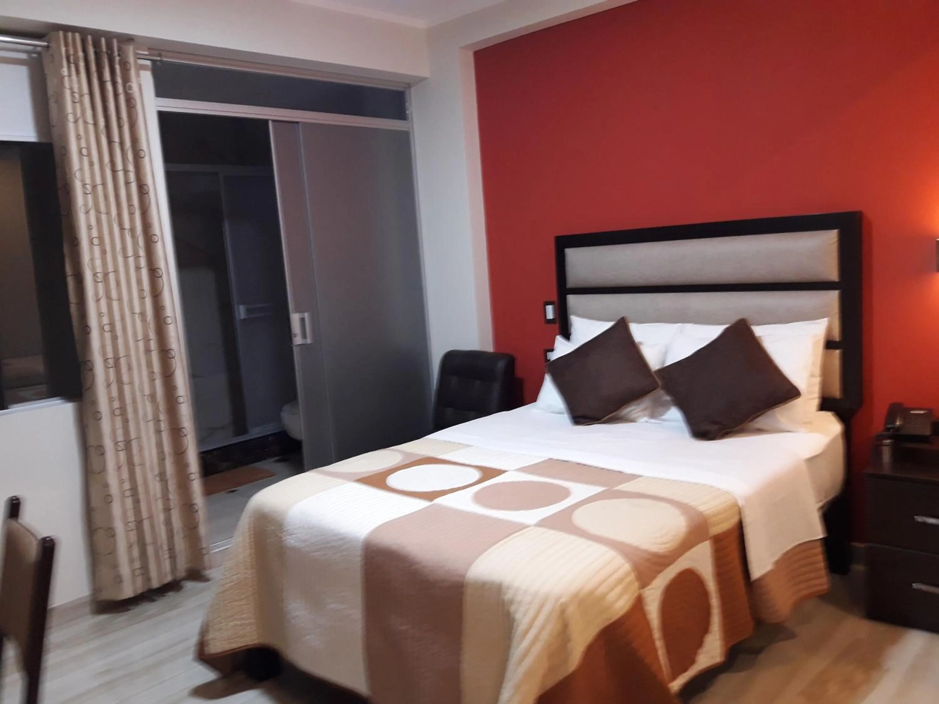 Bed in Gavina Inn Hotel