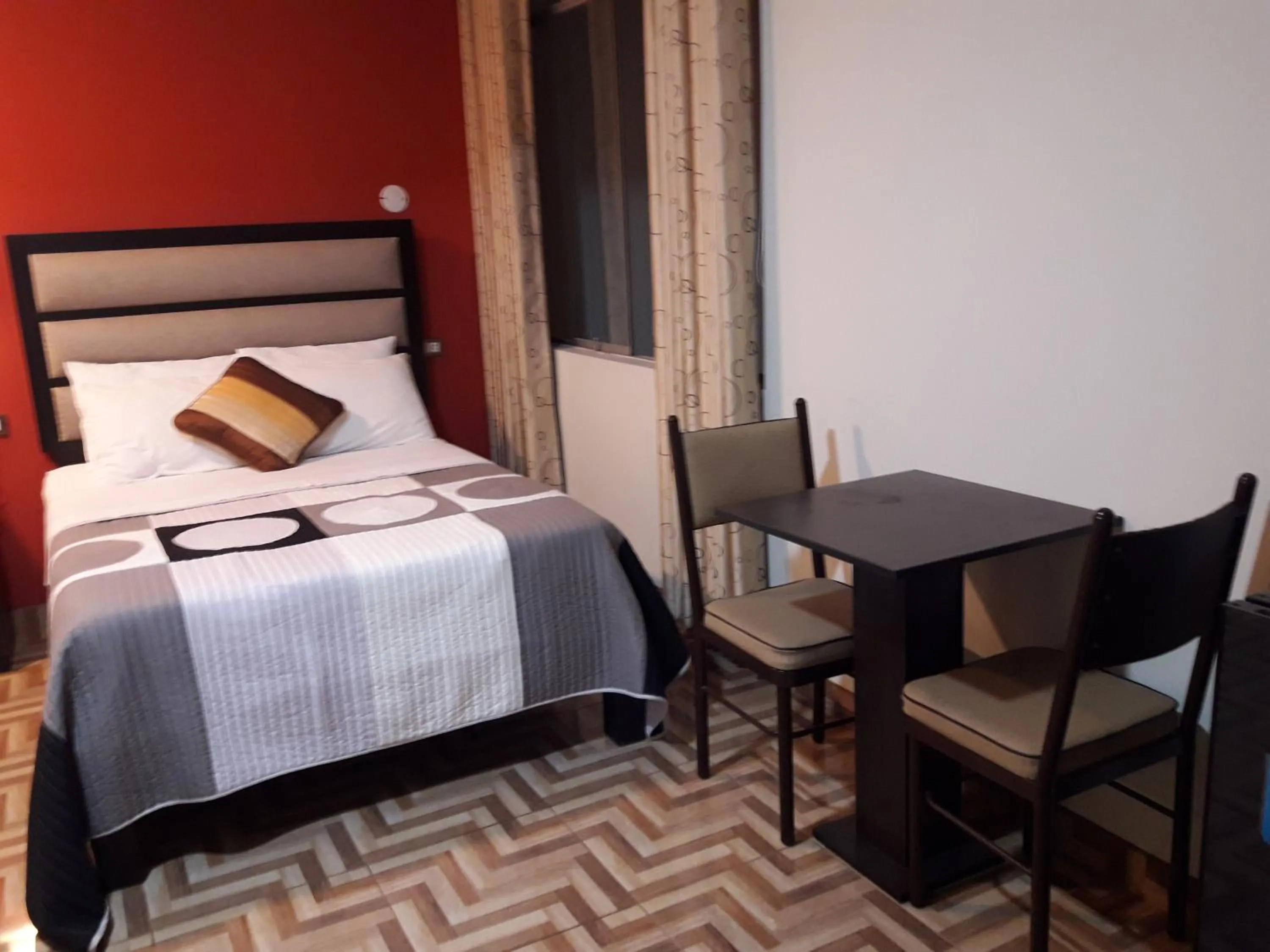 Bed in Gavina Inn Hotel