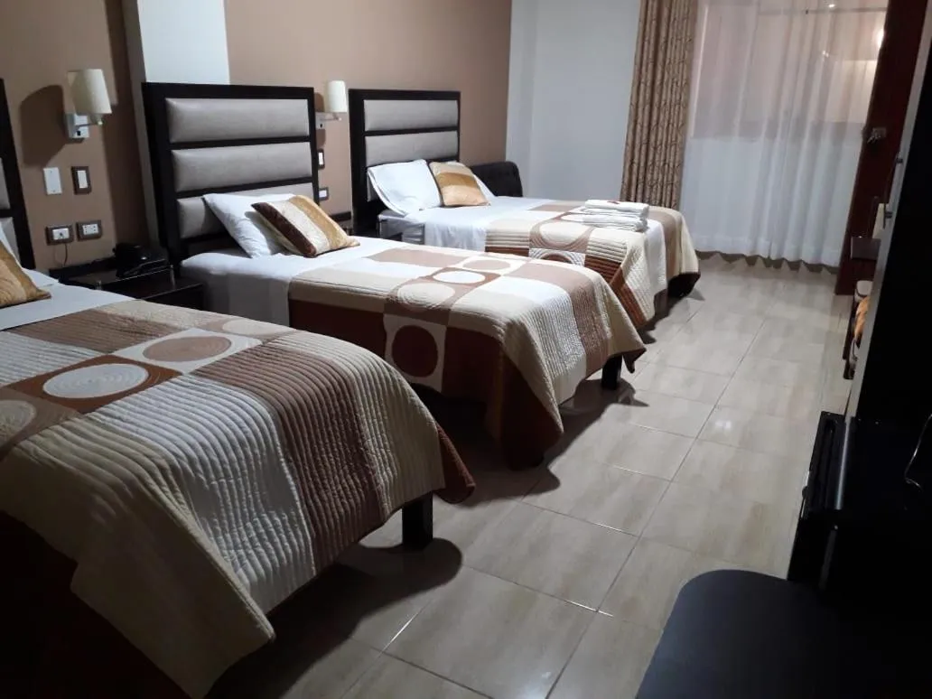 Bed in Gavina Inn Hotel