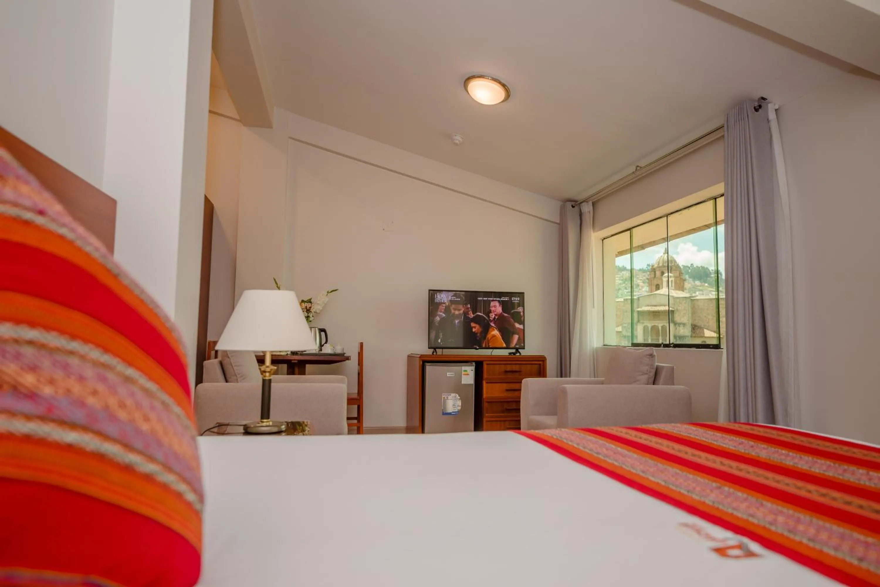 Bed in Quechua Plaza Hotel