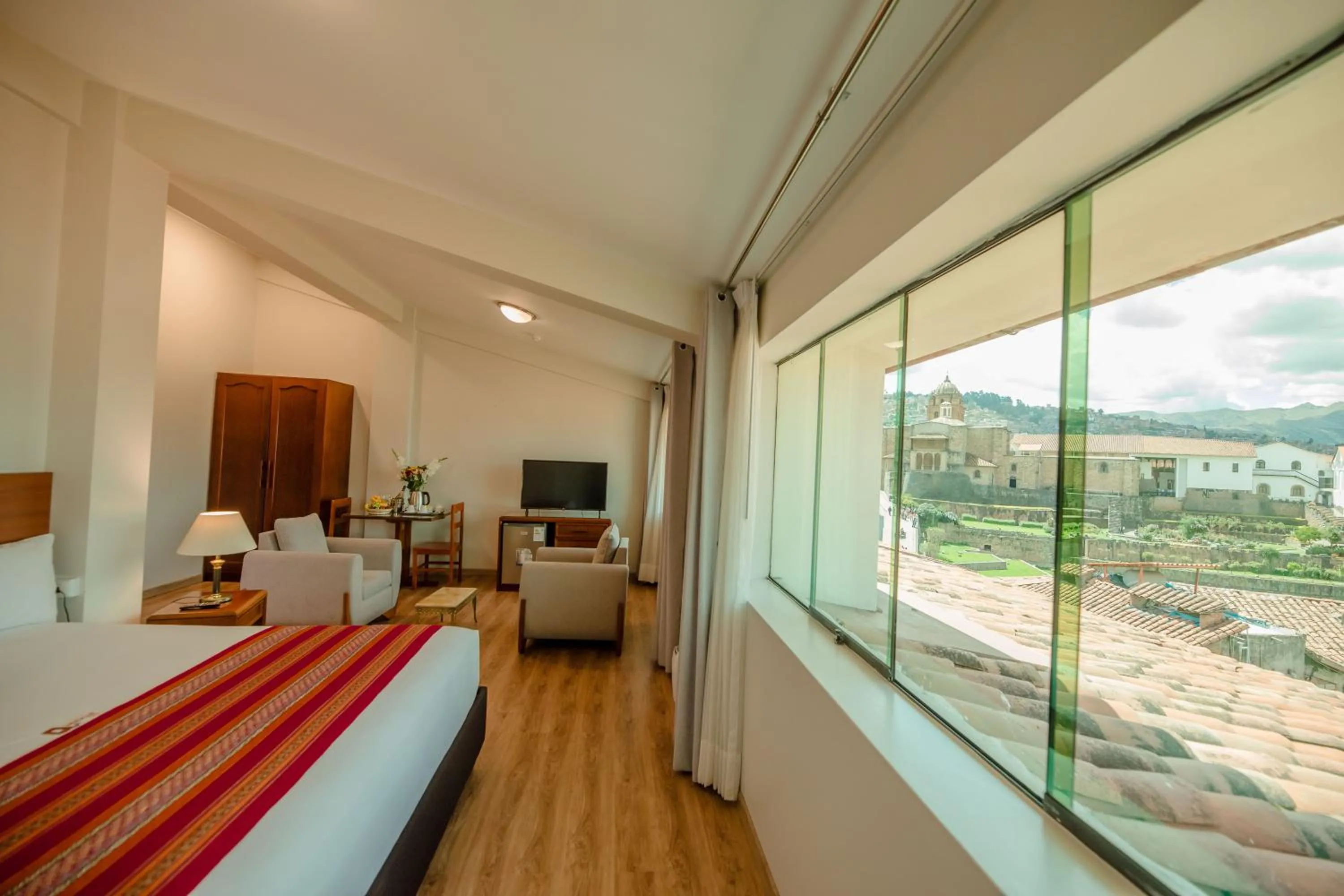 Bed in Quechua Plaza Hotel