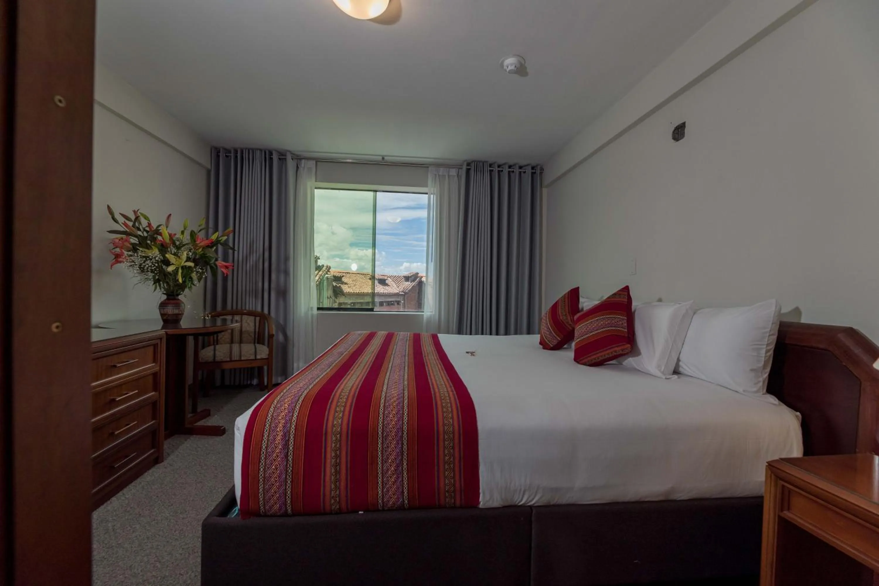 Bed in Quechua Plaza Hotel