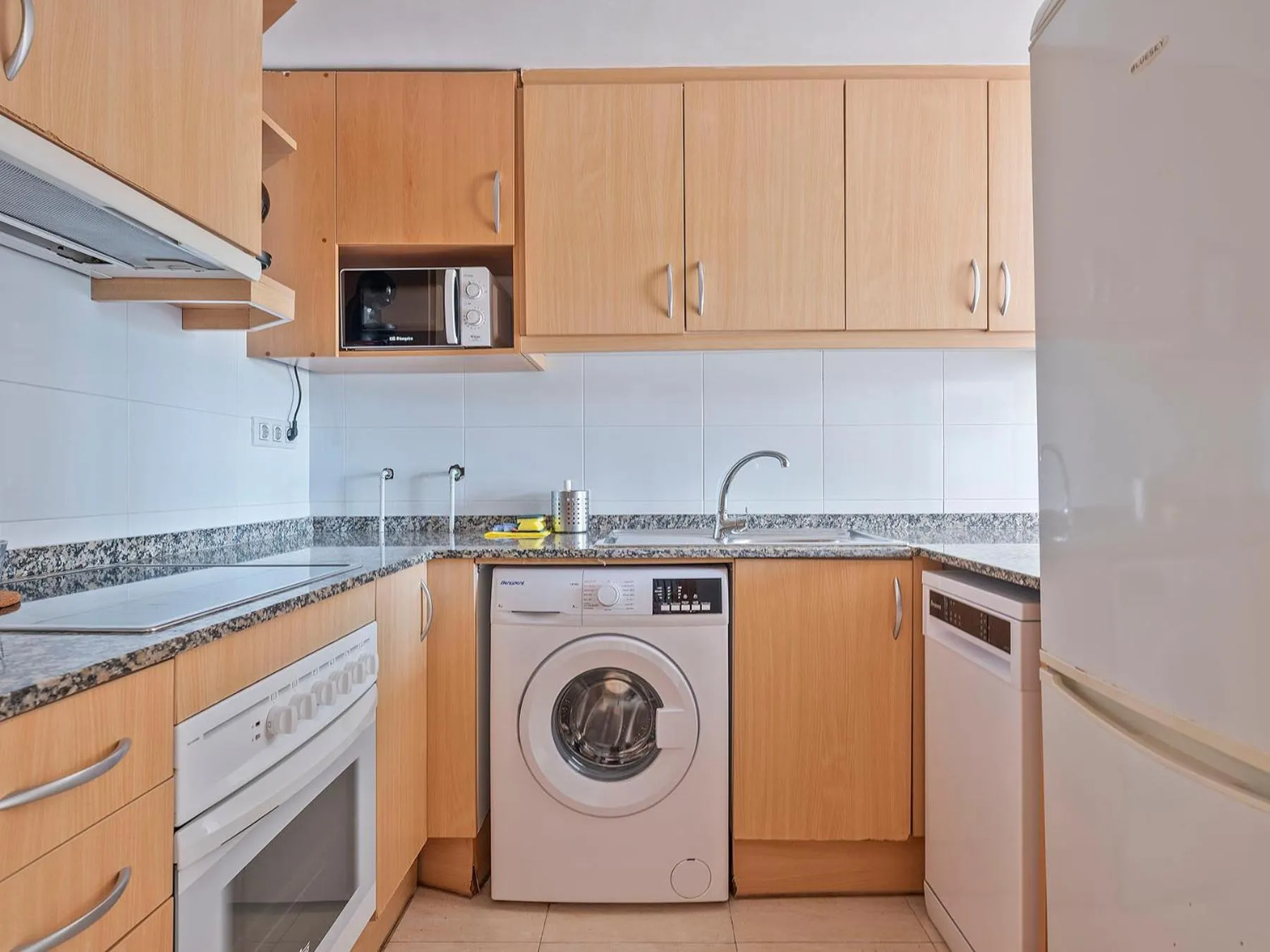 Kitchen or kitchenette in Apartamentos Velor