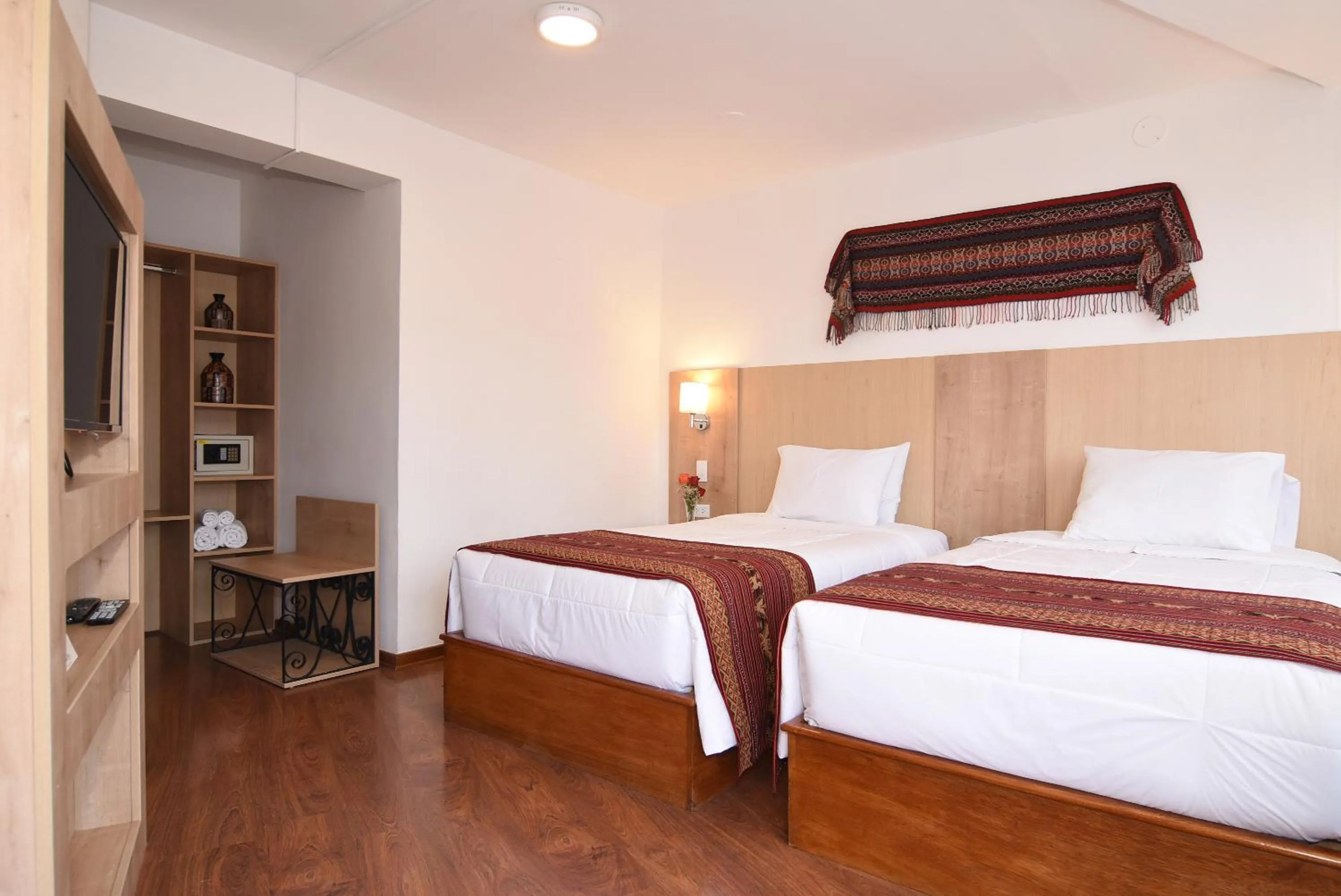 Bed in Hotel Prisma Cusco