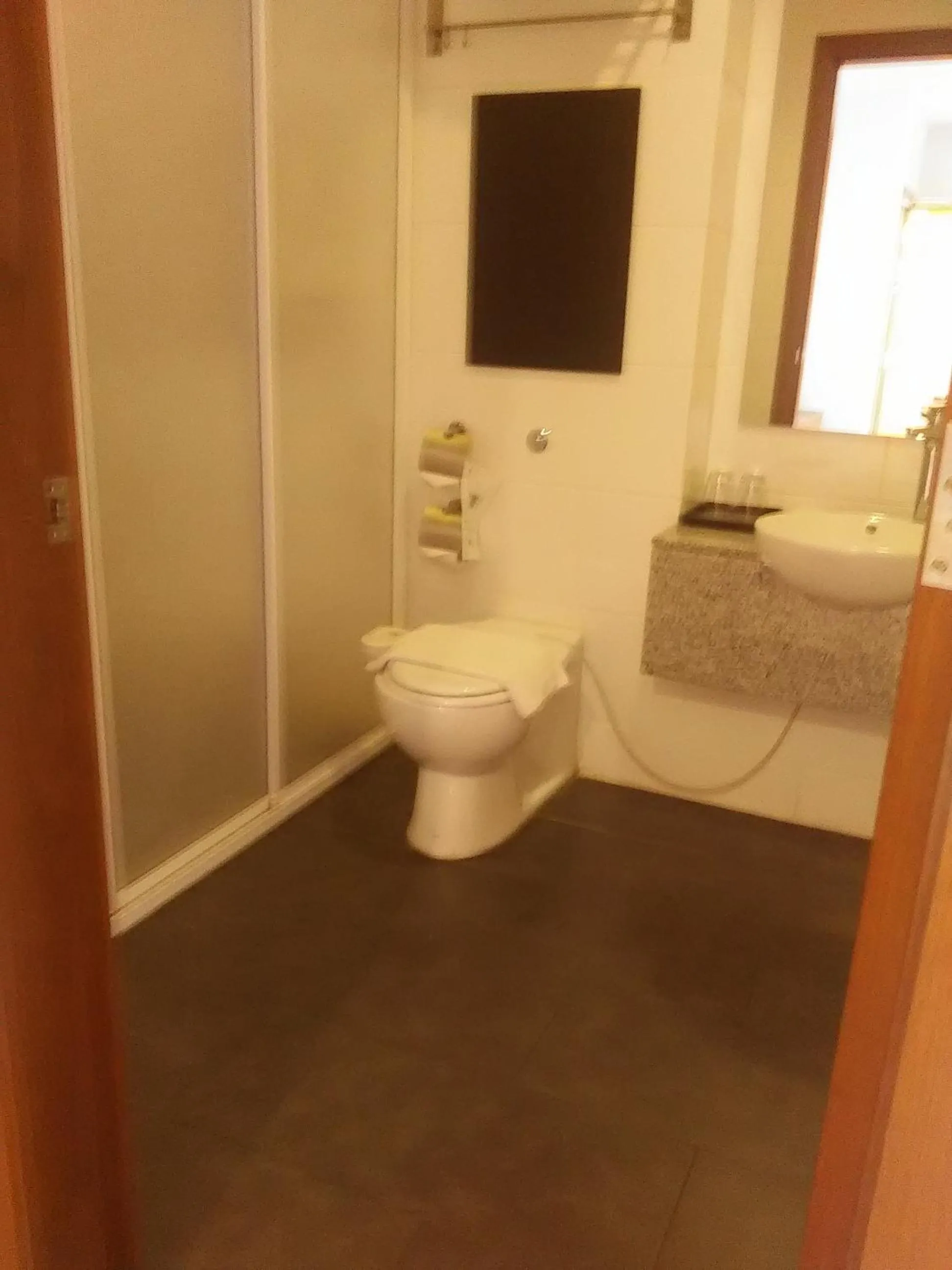 Bathroom in Gloria Swiss Hotel & Apartment Sandakan