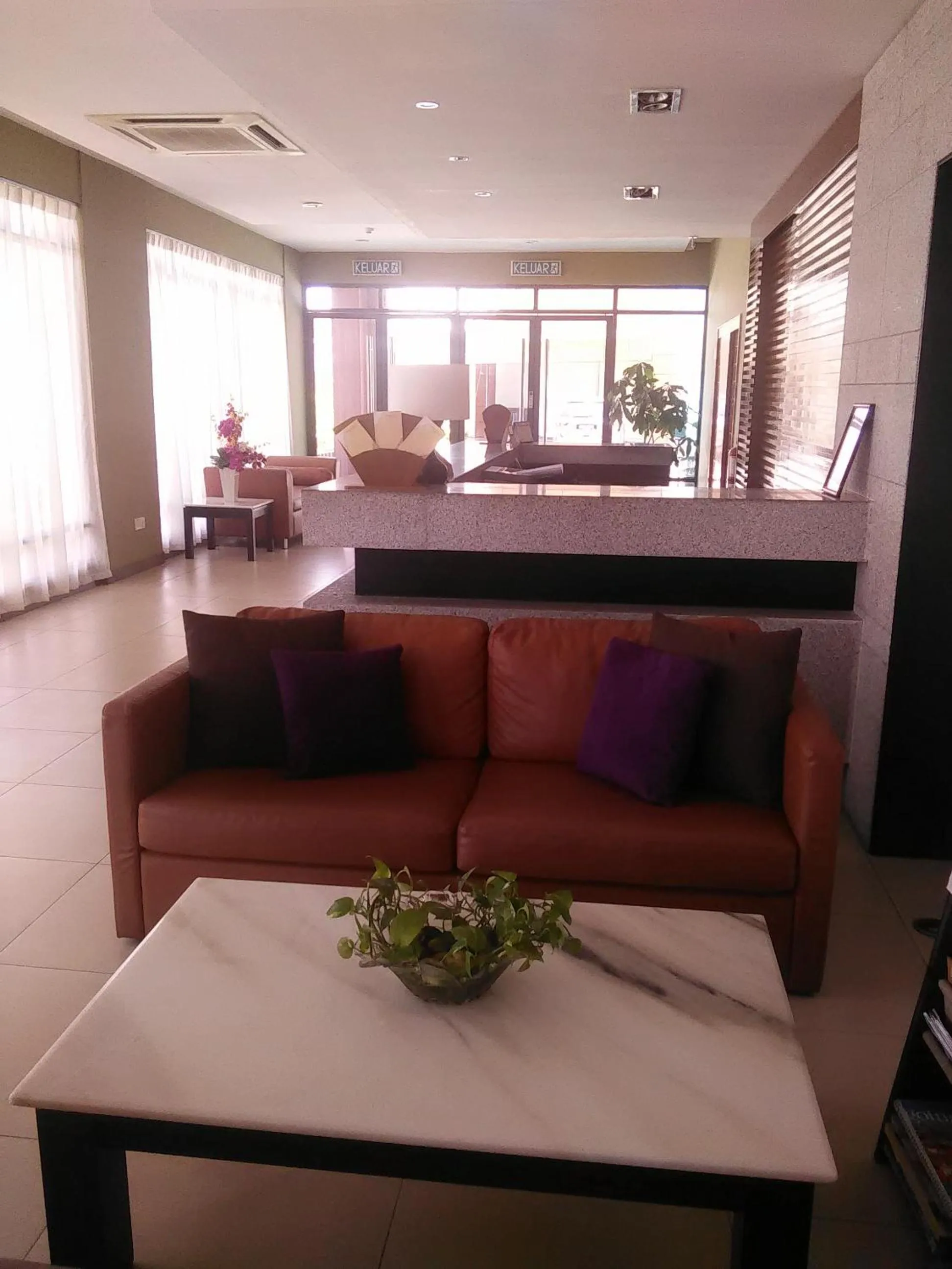 Lobby or reception in Gloria Swiss Hotel & Apartment Sandakan