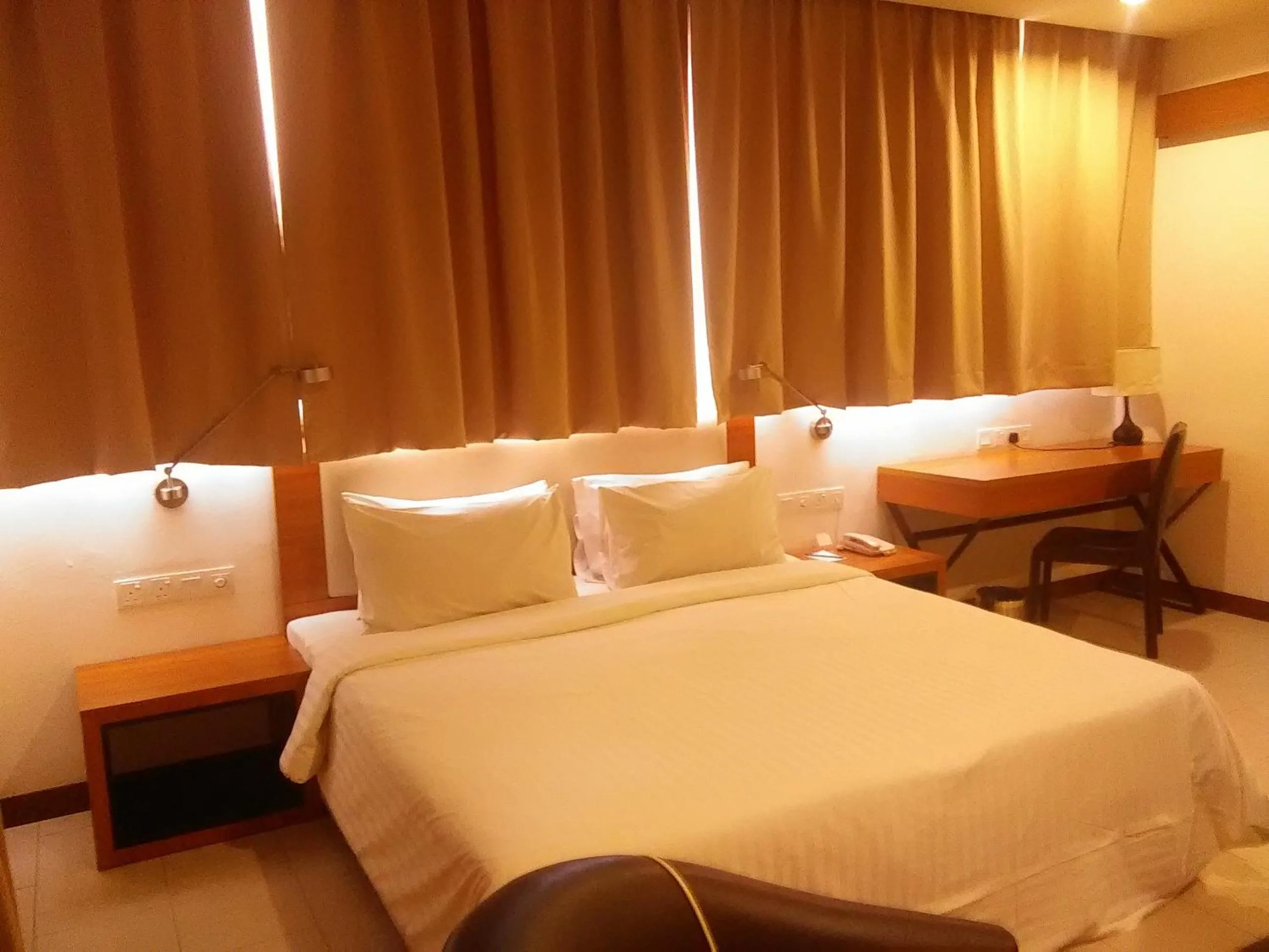 Bedroom, Bed in Gloria Swiss Hotel & Apartment Sandakan