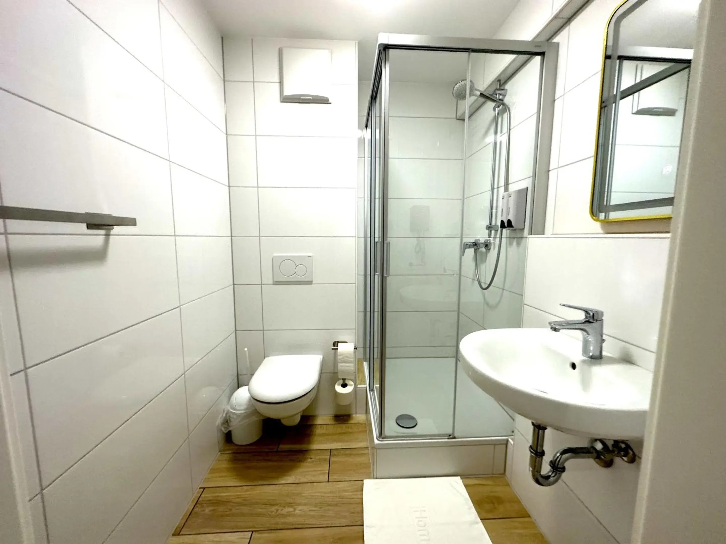 Bathroom in Home Inn Hotel Bathroom in Home Inn Hotel