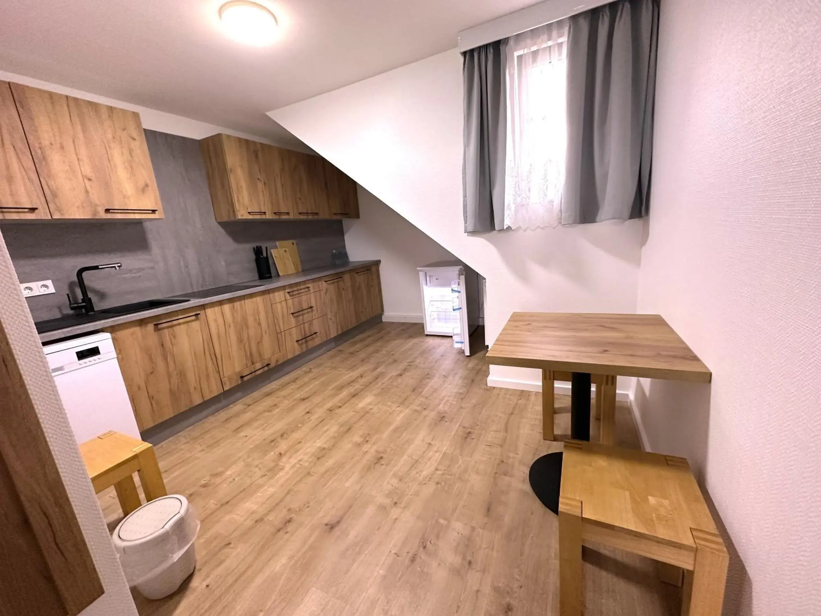 Kitchen or kitchenette in Home Inn Hotel Kitchen or kitchenette in Home Inn Hotel