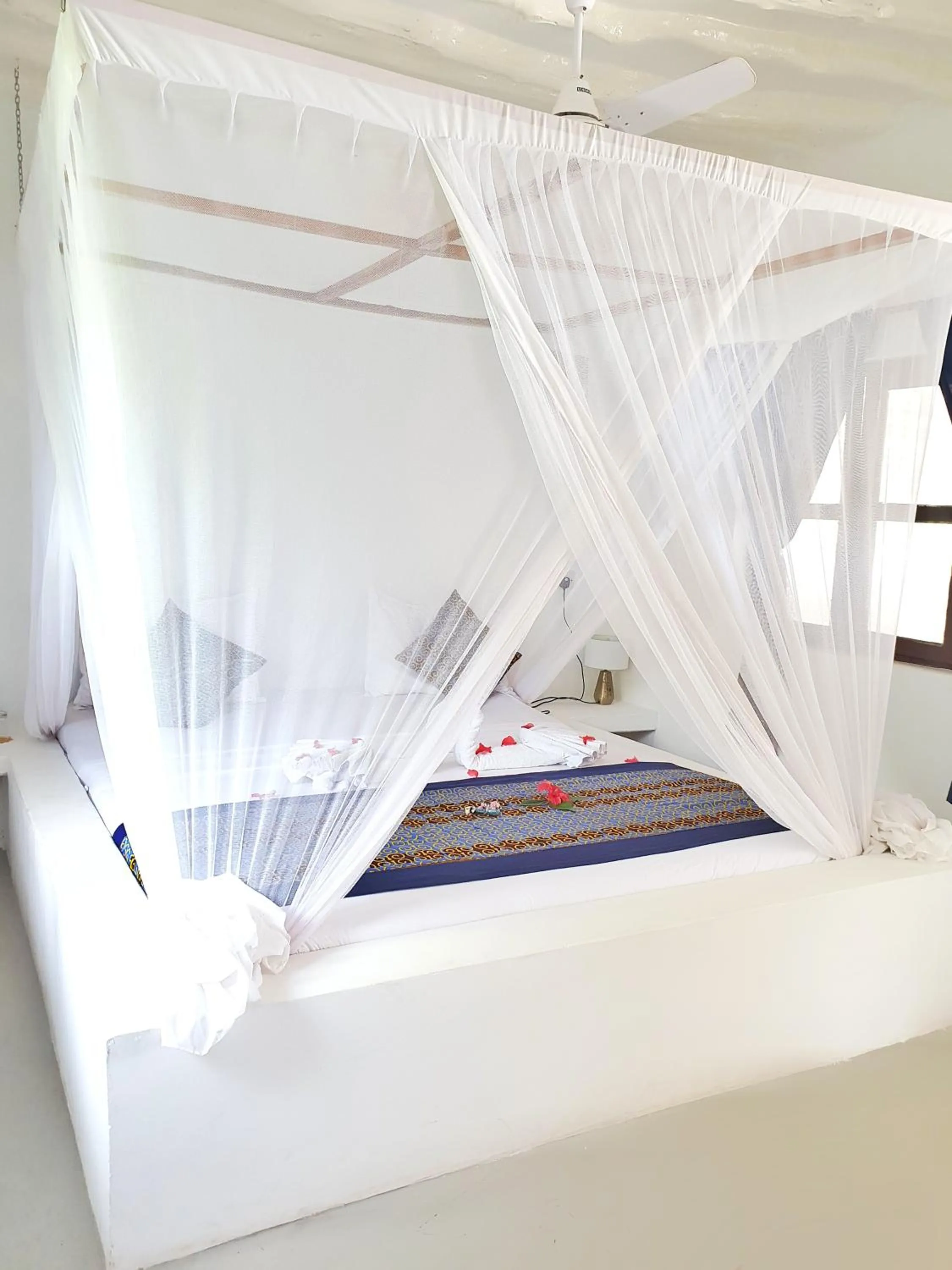 Bed in Blue Palm Zanzibar