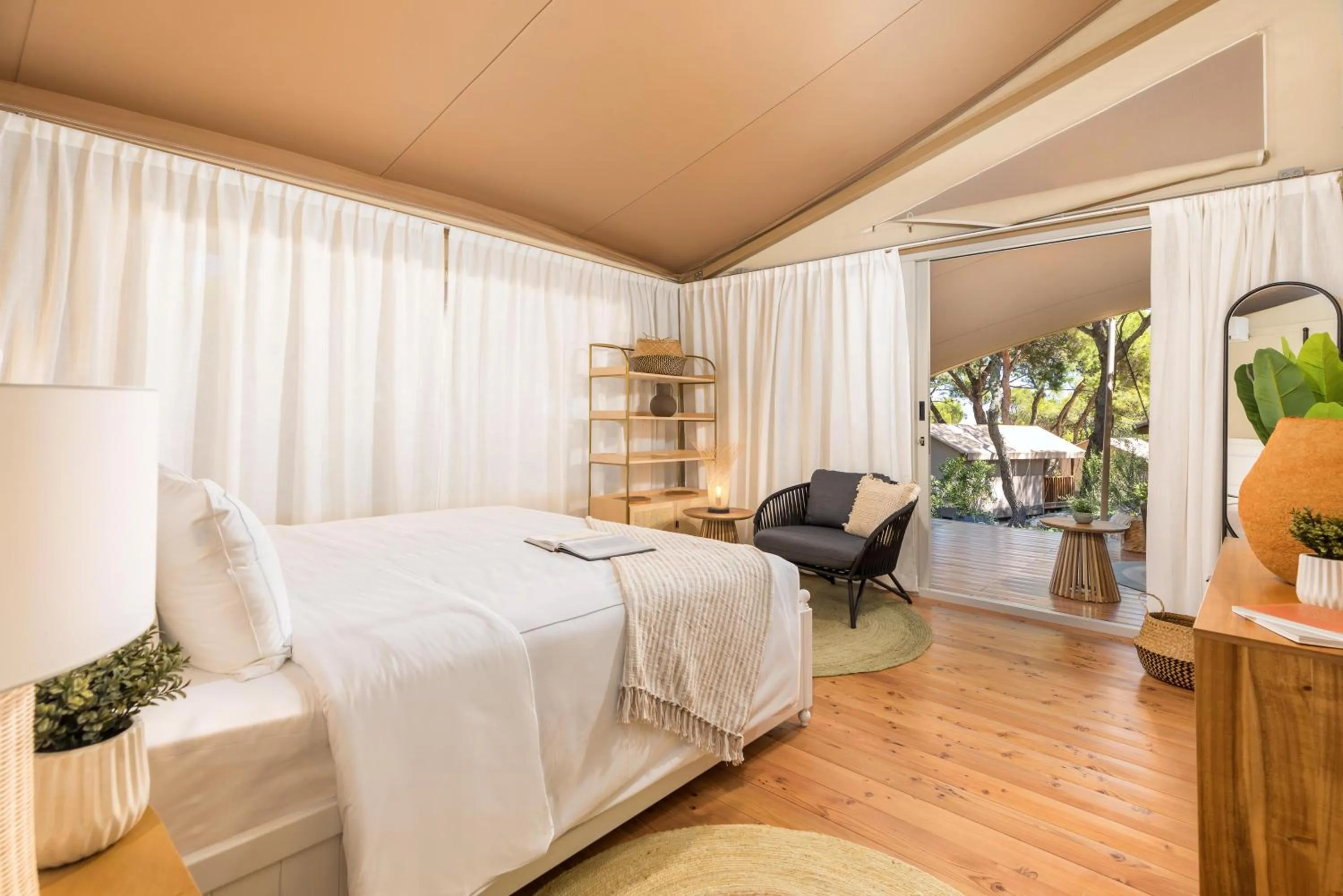 Bed in Arena One 99 Glamping