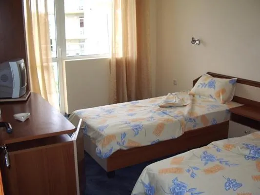 Bed in Vanessa Family Hotel