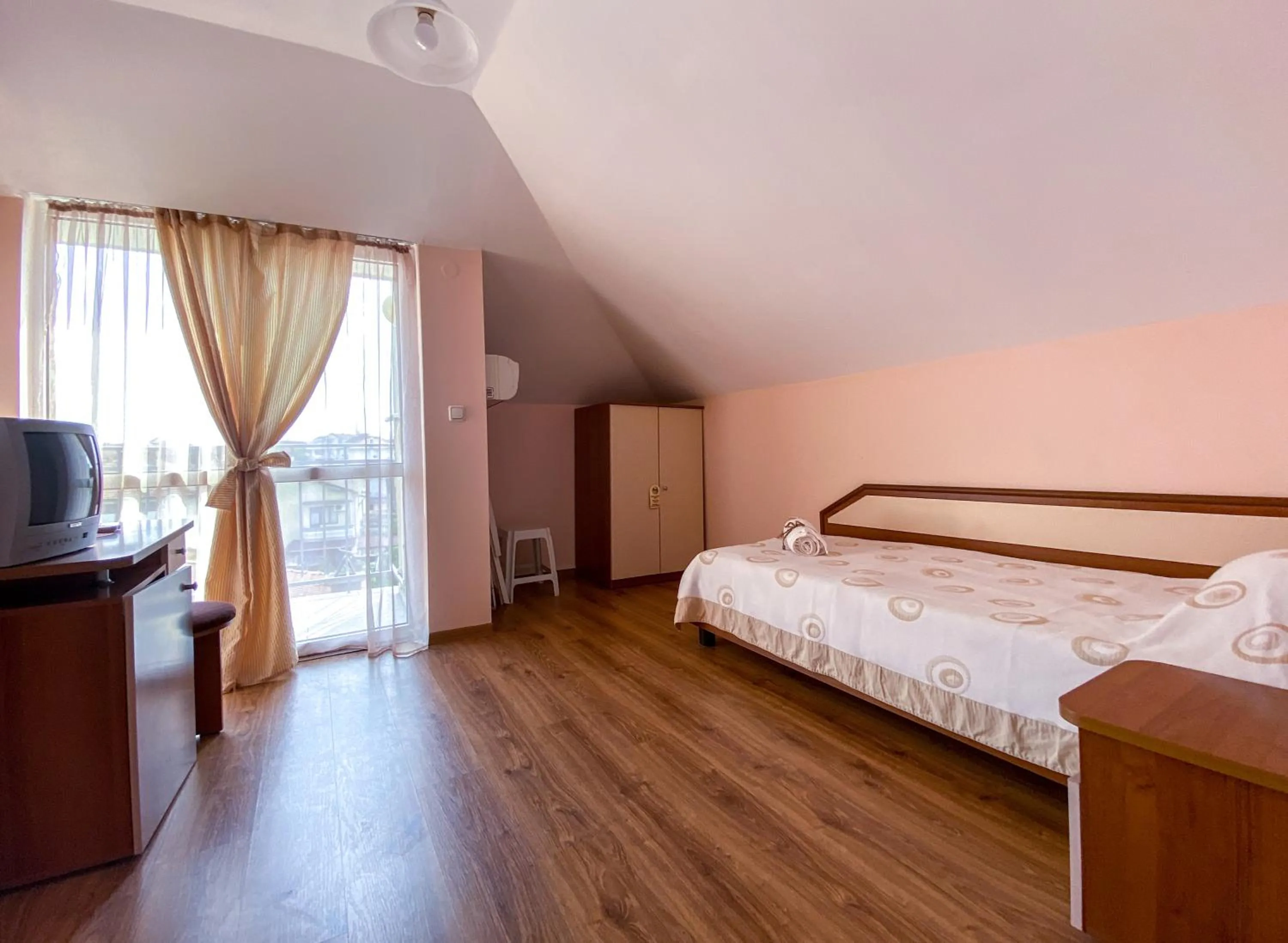 Bed in Vanessa Family Hotel