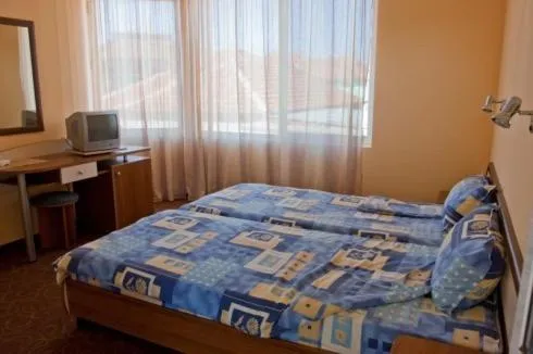 Bed in Vanessa Family Hotel