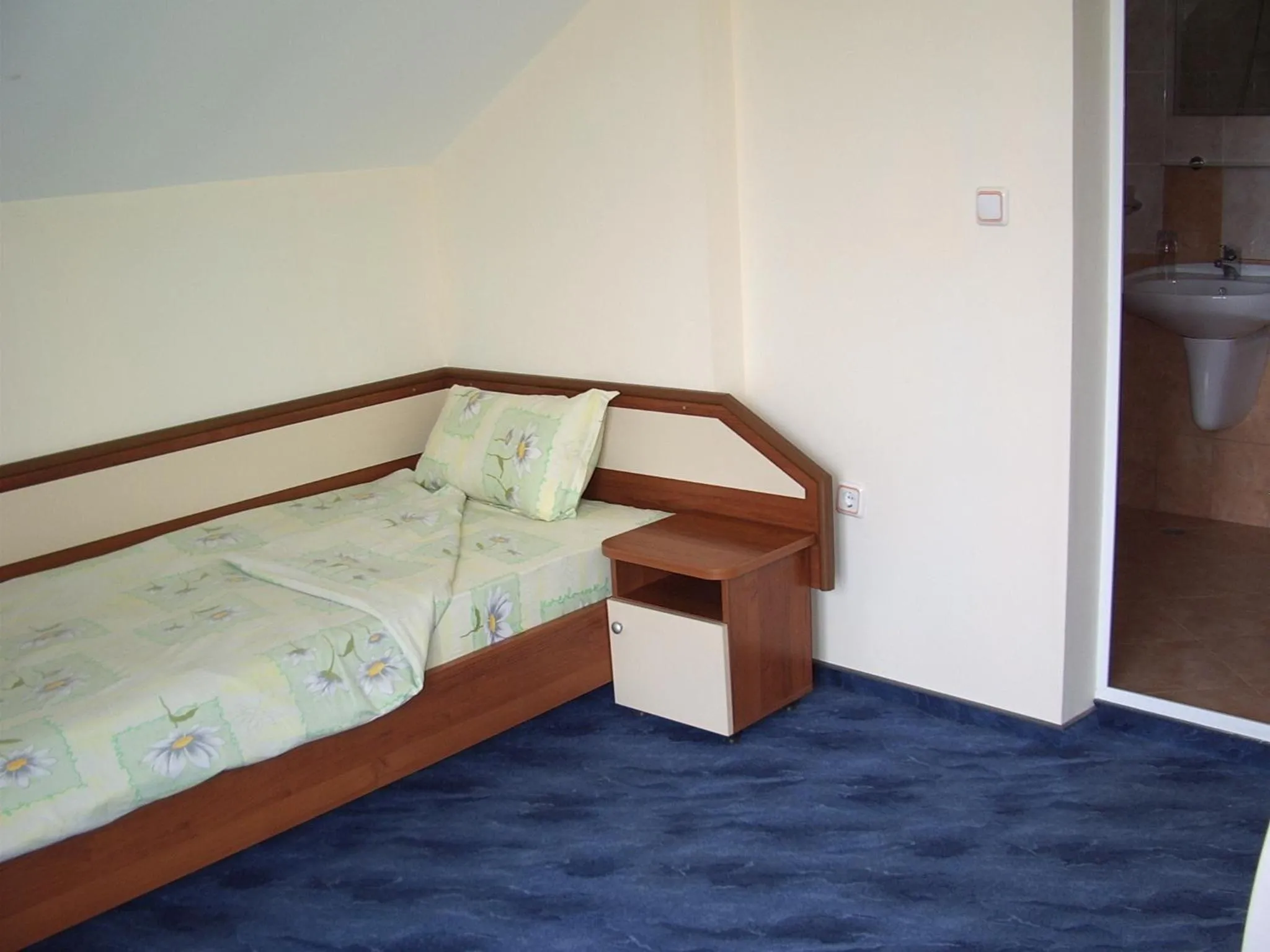Bed in Vanessa Family Hotel