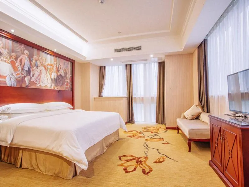 Bed in Vienna Hotel Jiangxi Yingtan International Glasses City