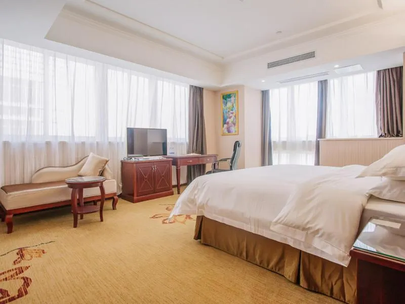 Bed in Vienna Hotel Jiangxi Yingtan International Glasses City