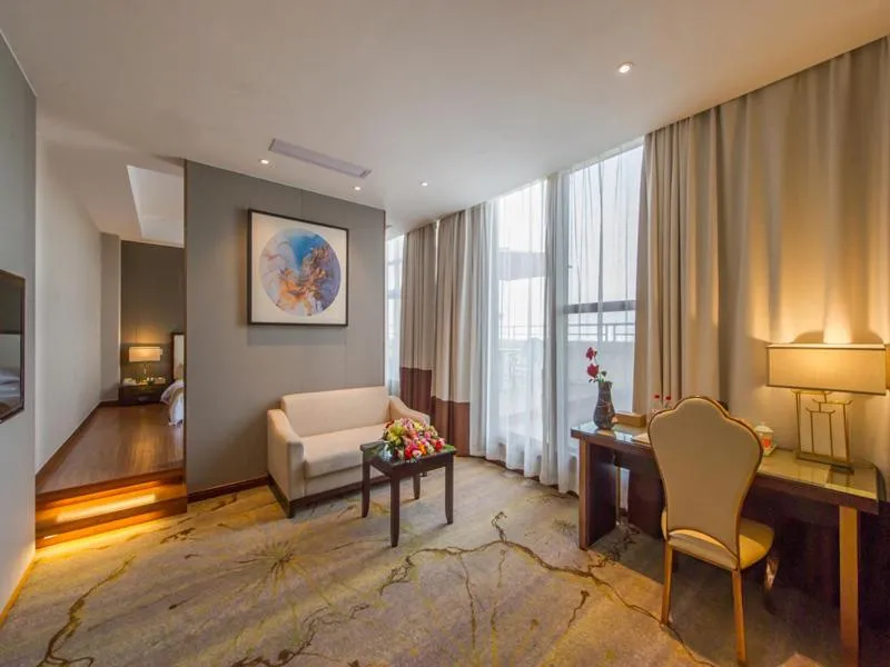 Bed in Vienna International Hotel Diecai Wanda High Speed ​​Rail Station