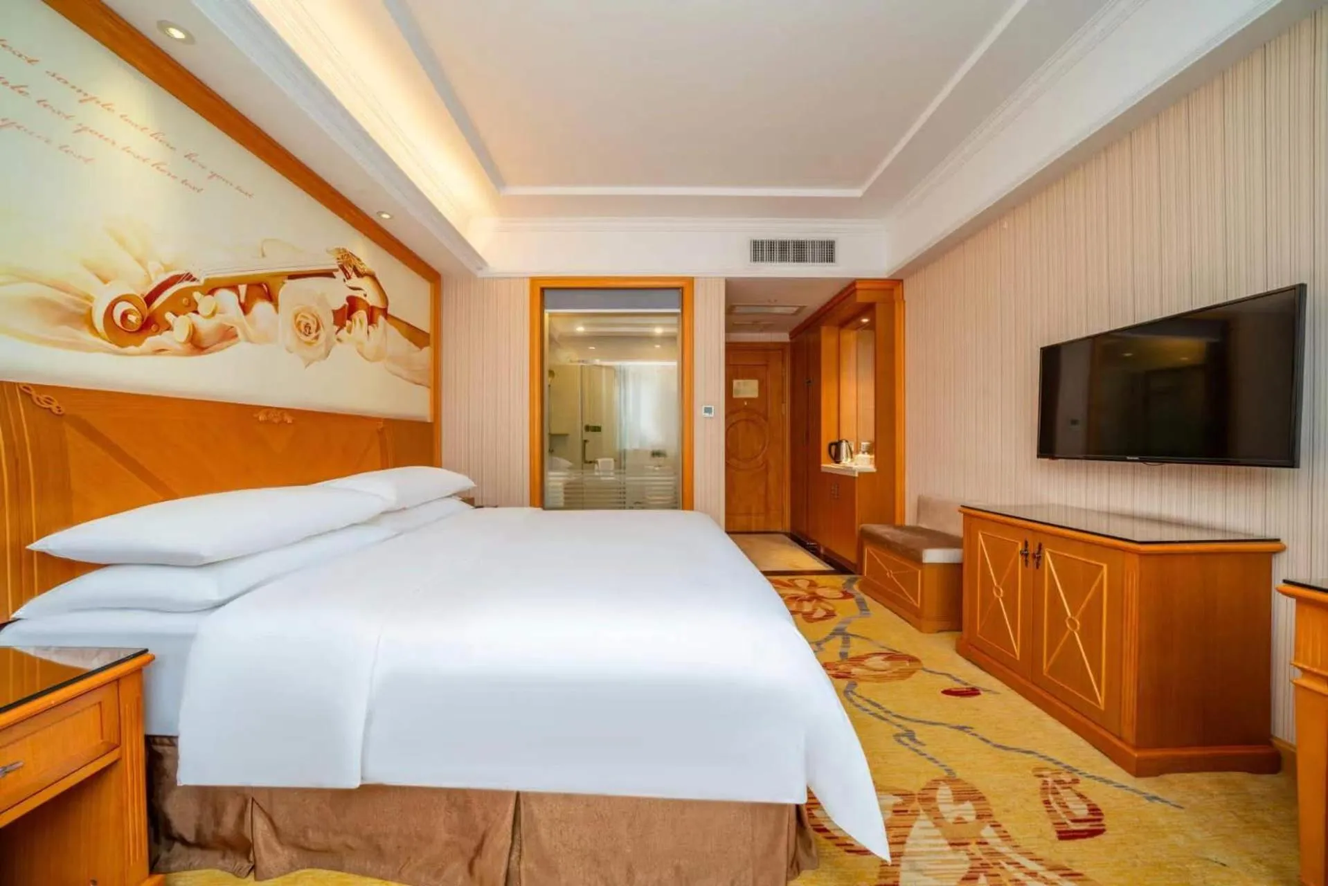 Bed in Vienna Hotel Shenzhen Longshen Subway Station