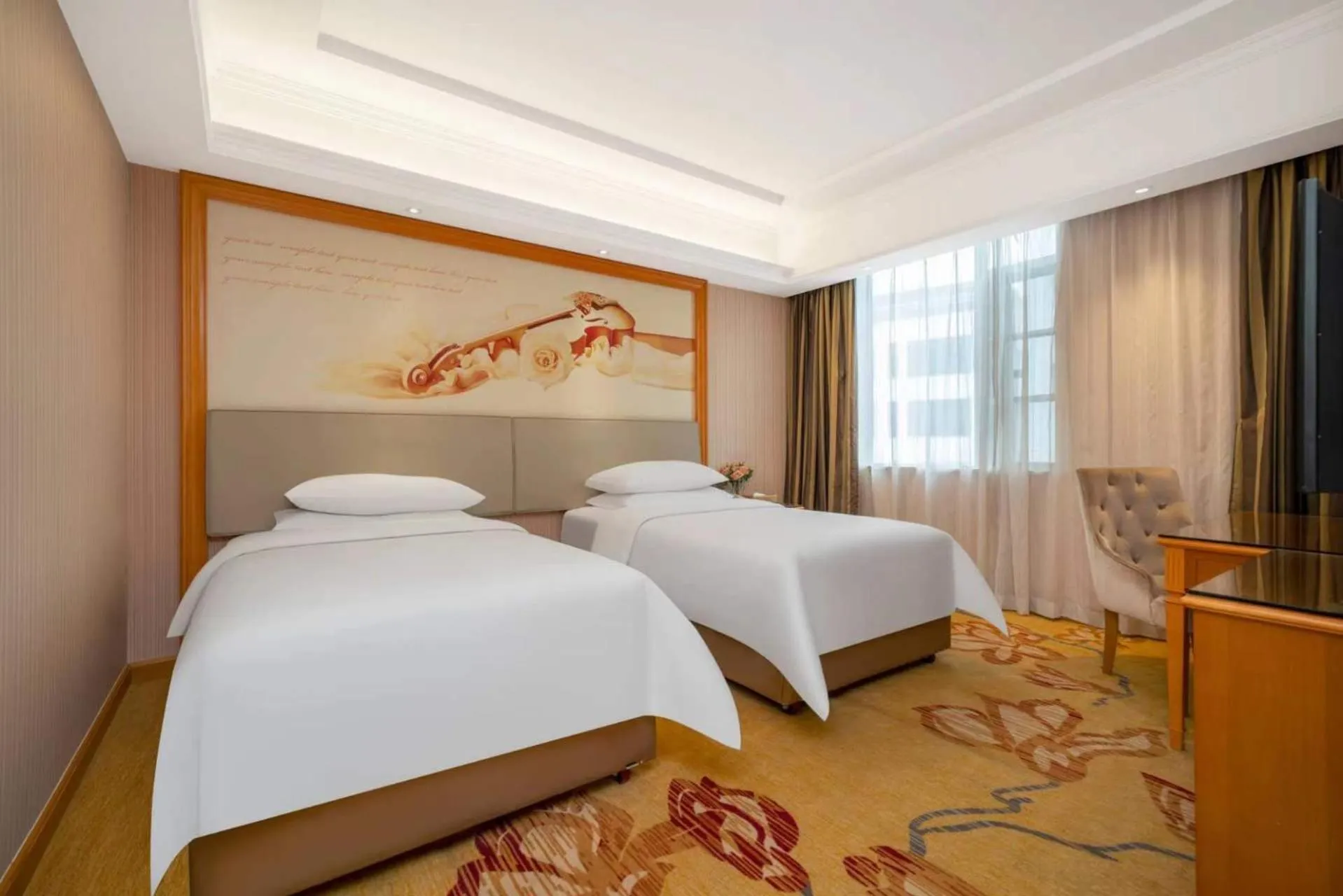 Bed in Vienna Hotel Shenzhen Longshen Subway Station