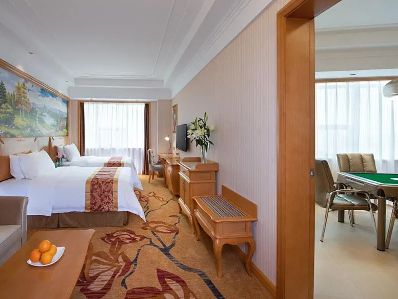 Bed in Venus International Hotel Shenzhen Gongming Tianhong