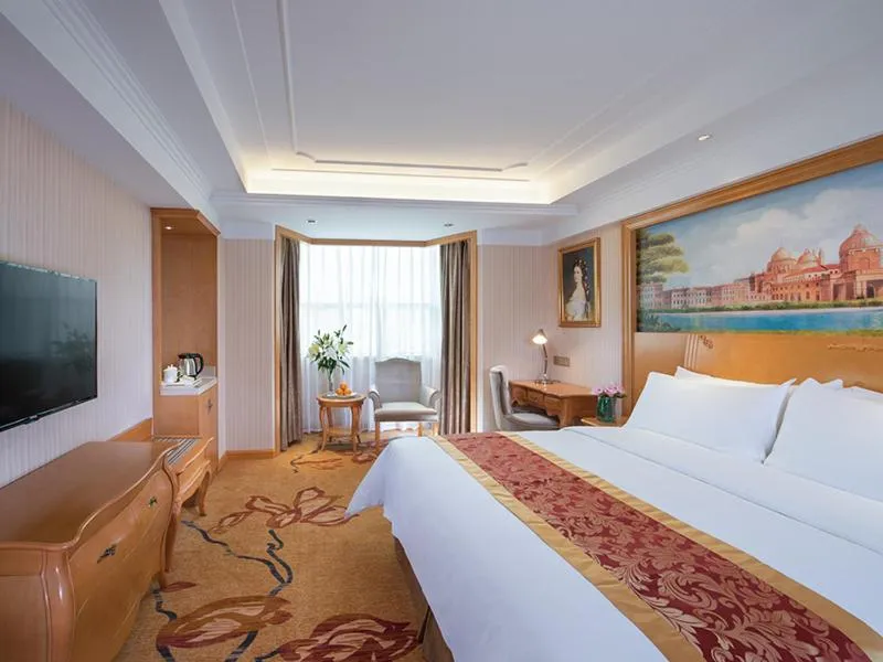 Bed in Venus International Hotel Shenzhen Gongming Tianhong
