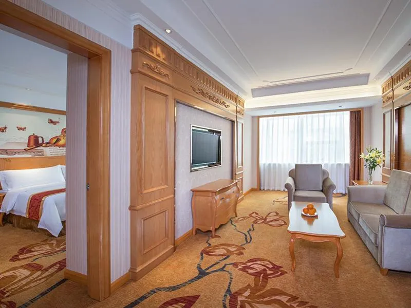 Bed in Venus International Hotel Shenzhen Gongming Tianhong