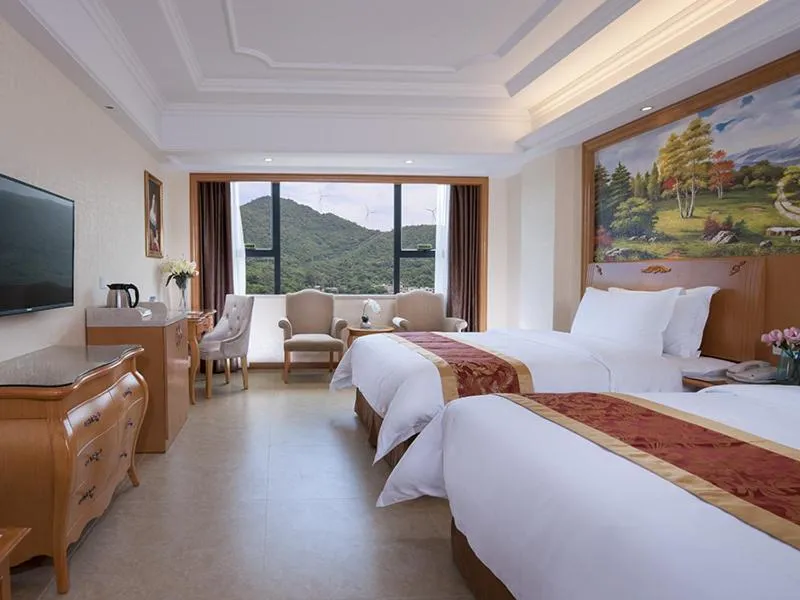 Bed in Vienna International Hotel Guangdong Yangjiang Zapo Travel Avenue